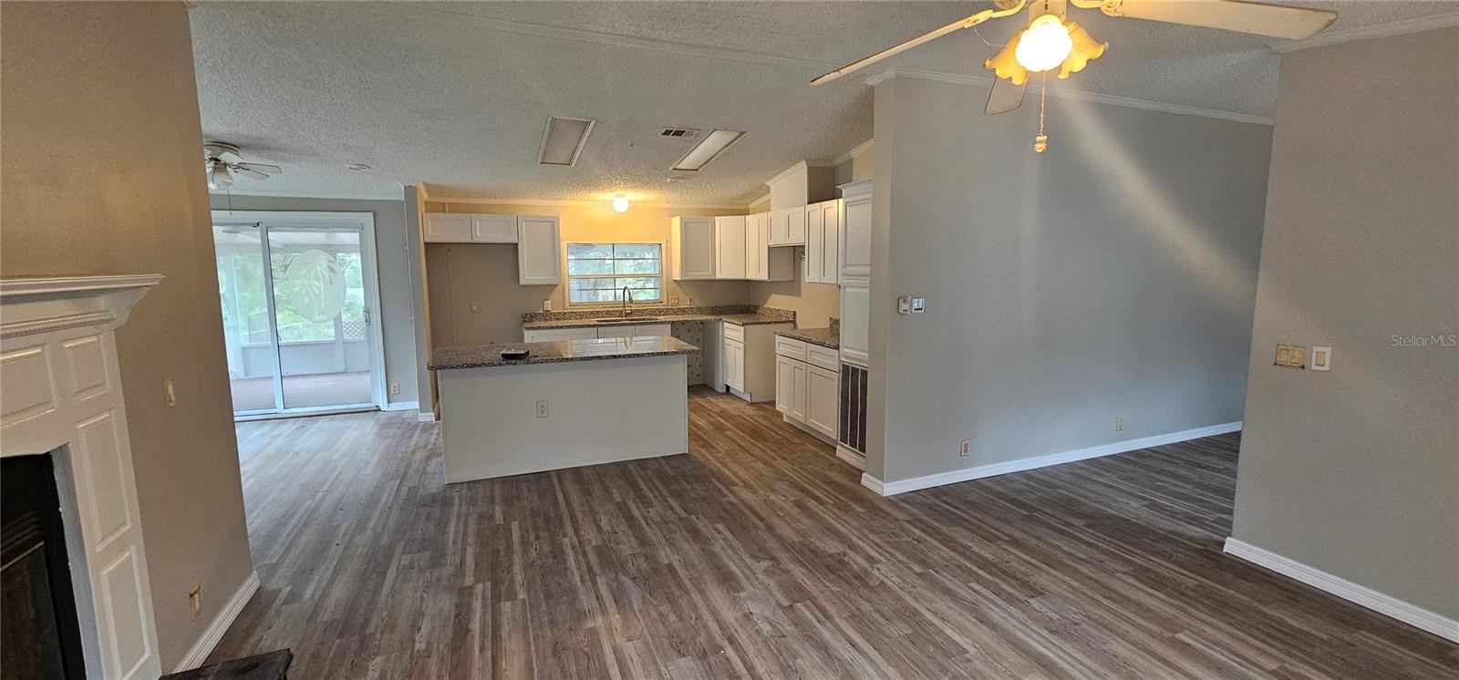 Living room looking into kitchen