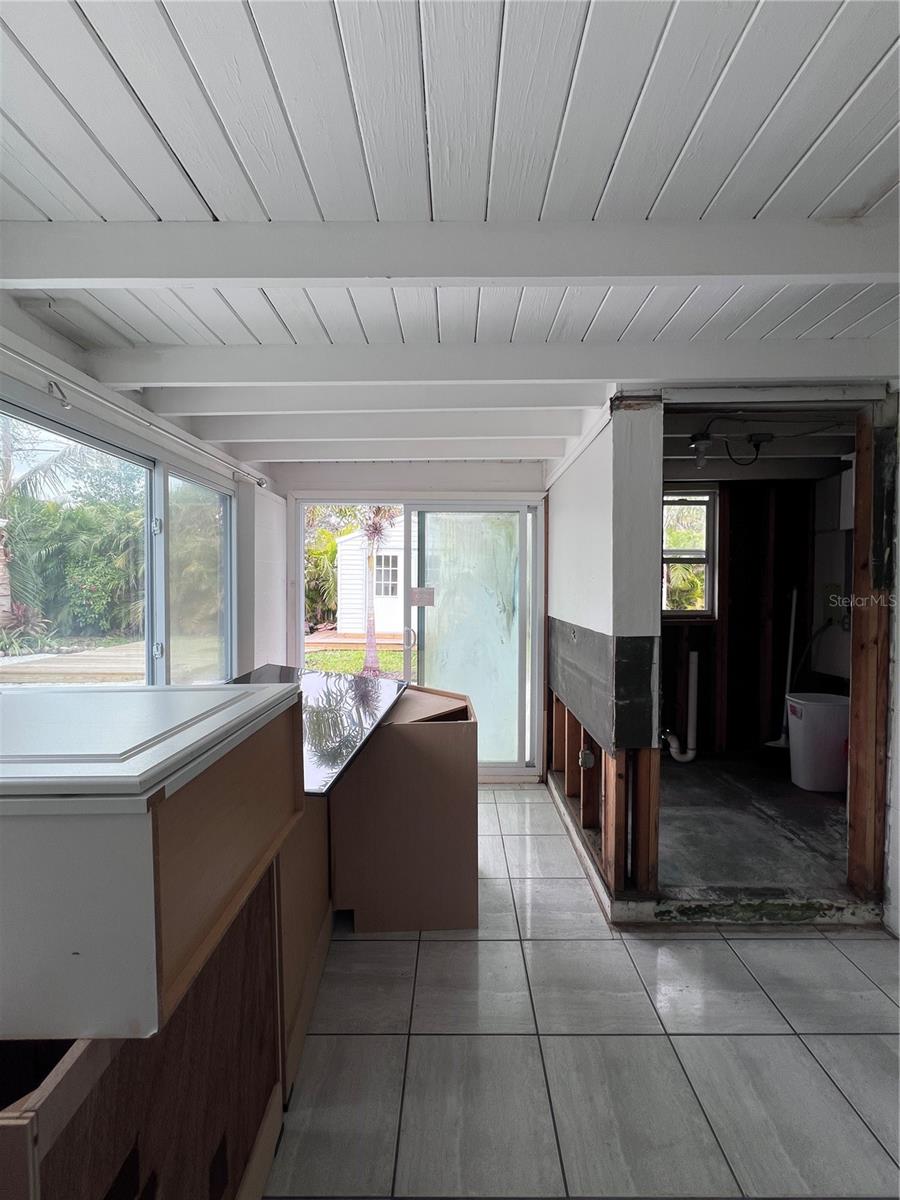 Sunroom with indoor laundry