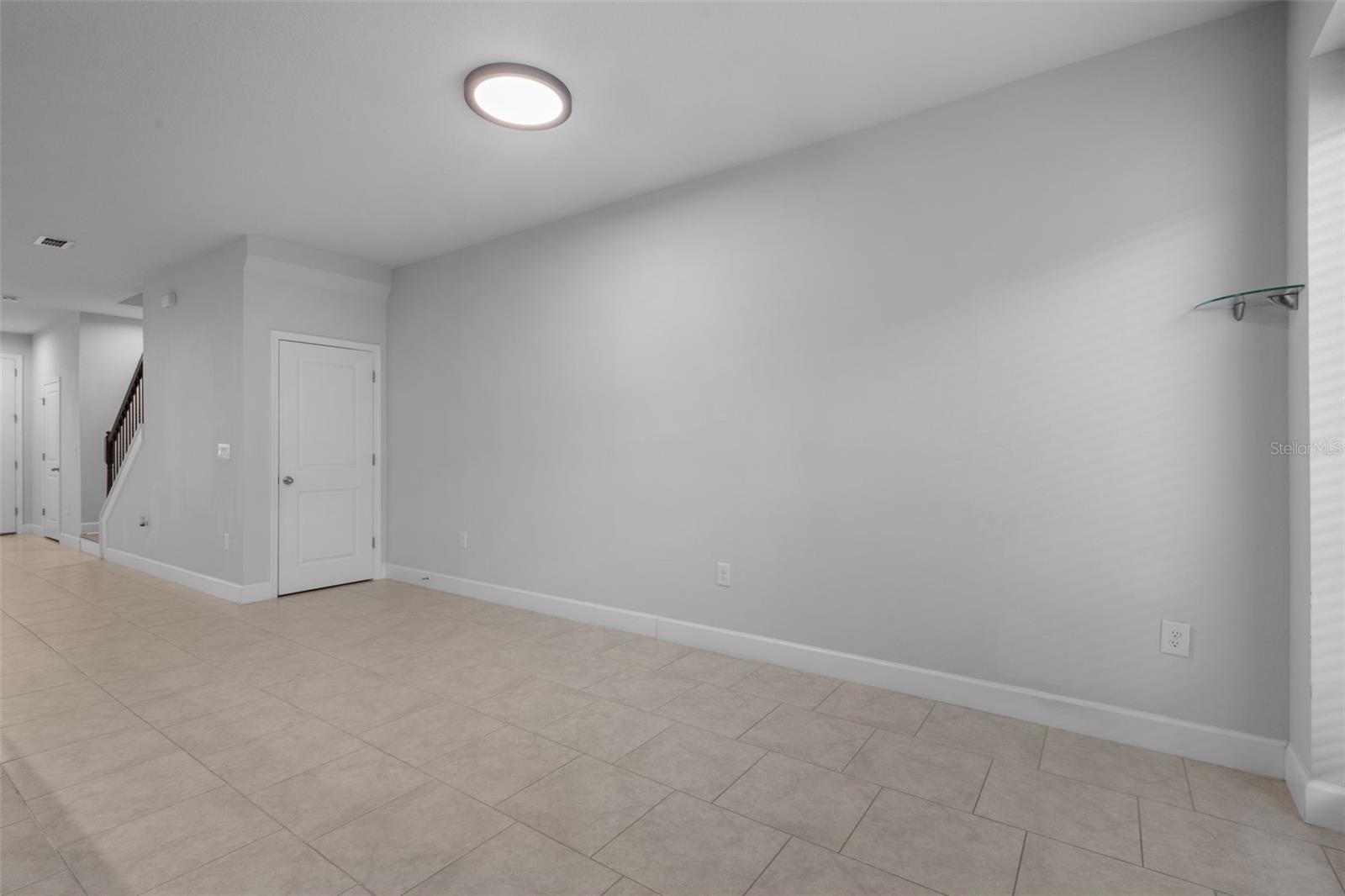 Dining Area - door in photo is under stair storage