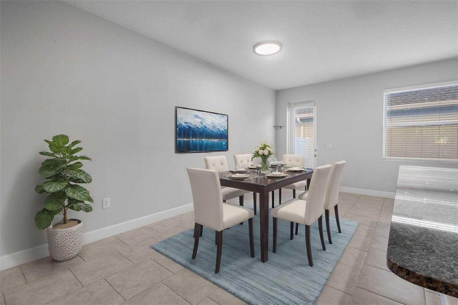 Dining Area off kitchen - virtually staged