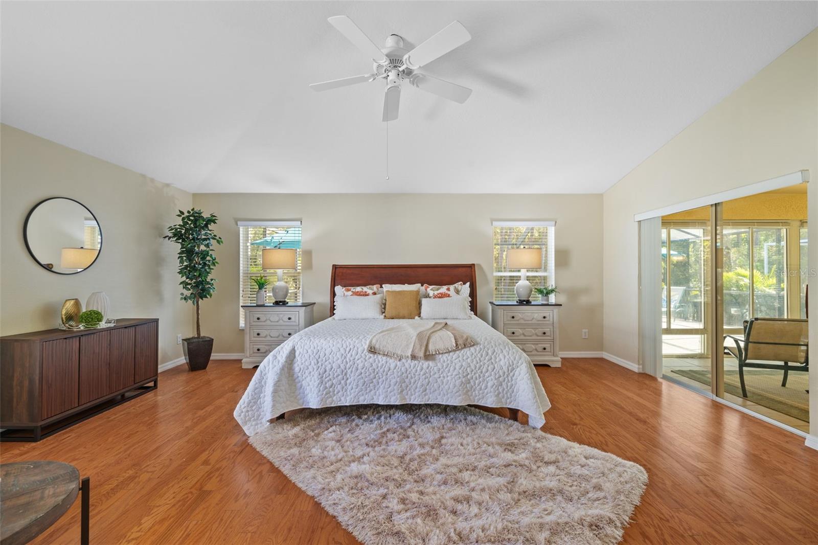 Builder Expanded Master Bedroom, sliders to Sunroom