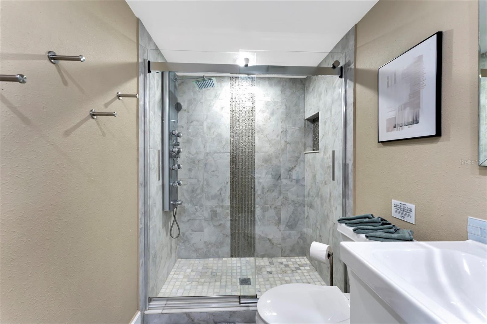 Tile, walk-in shower with wall jets