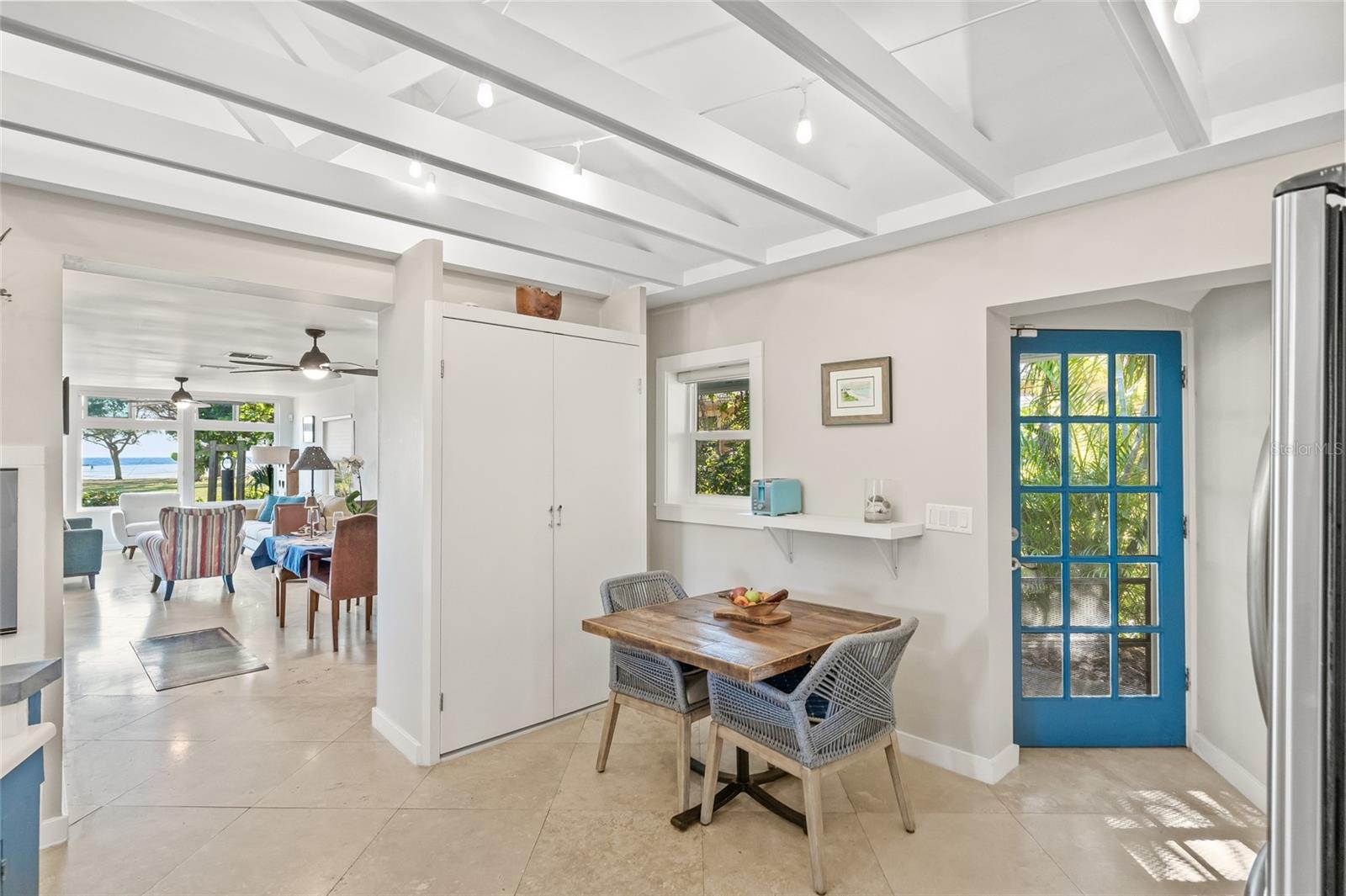 Convenient and charming door next to the breakfast nook area.