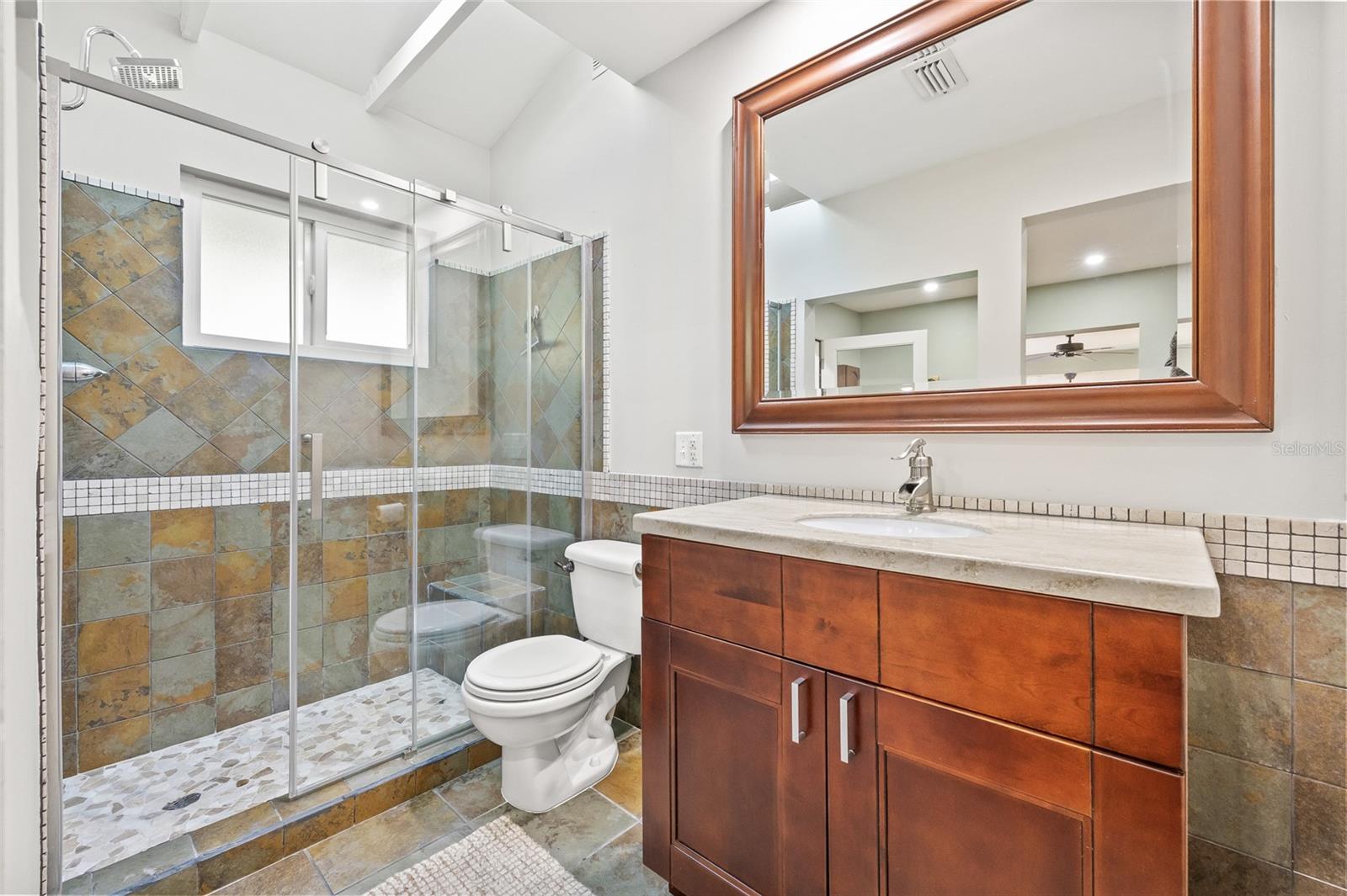 Primary suite features an ensuite bathroom for ultimate privacy and comfort.