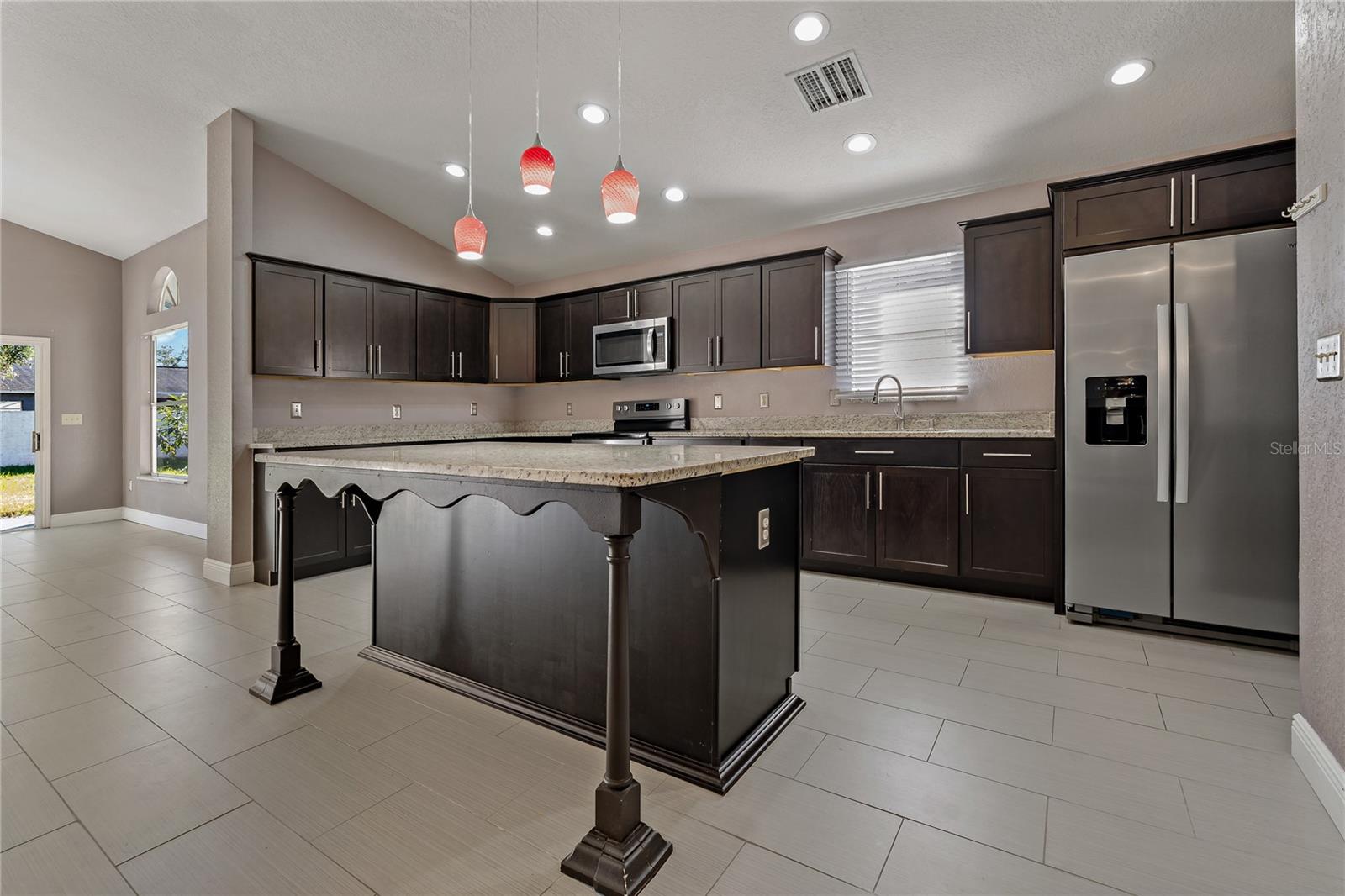 Kitchen with Island and Stainless Appliances