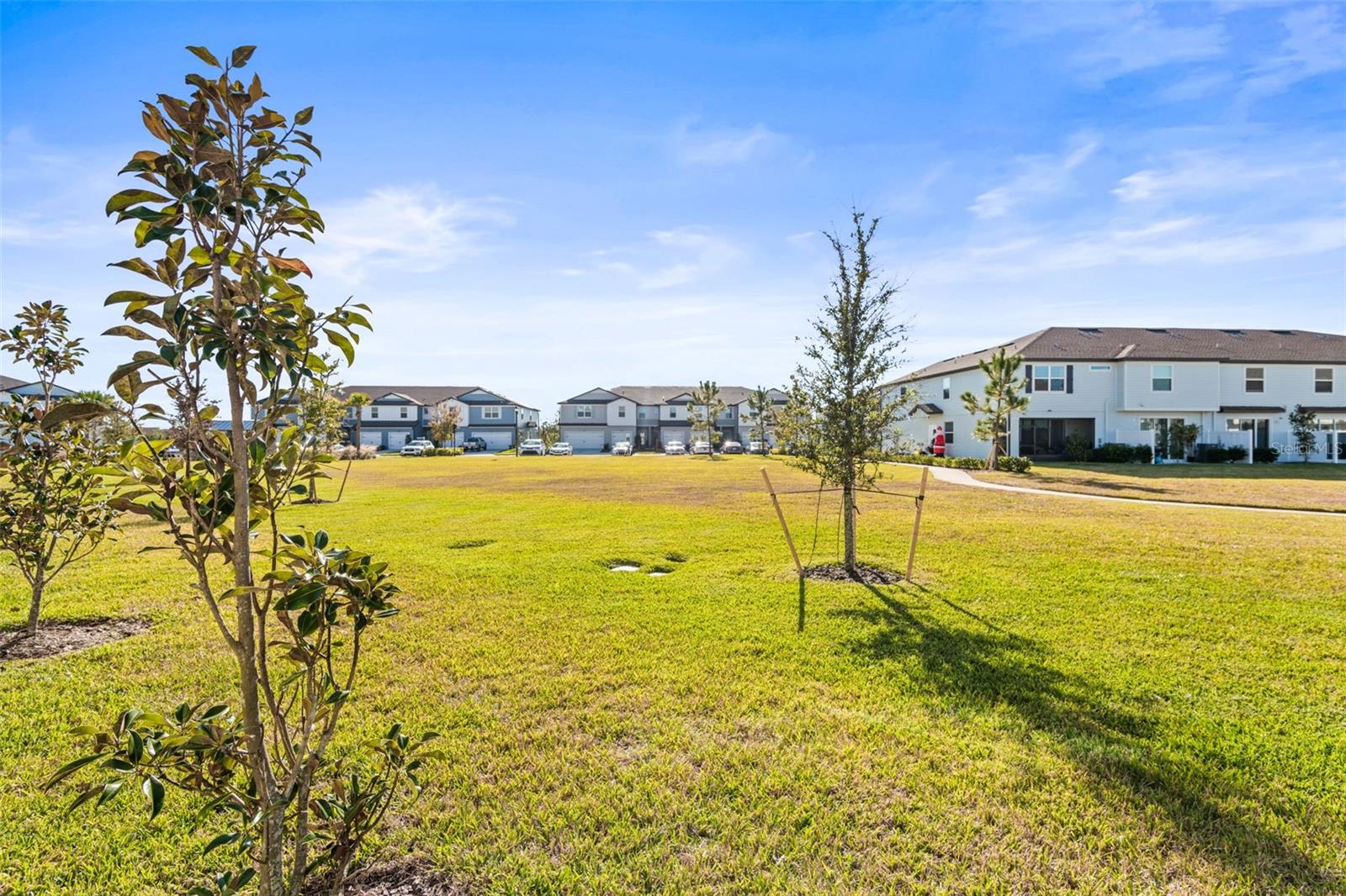 Huge park behind this townhome with ample room & no immediate rear neighbors.