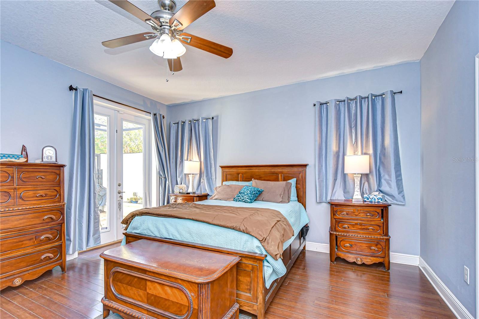 Primary Bedroom has French Doors to Private Courtyard