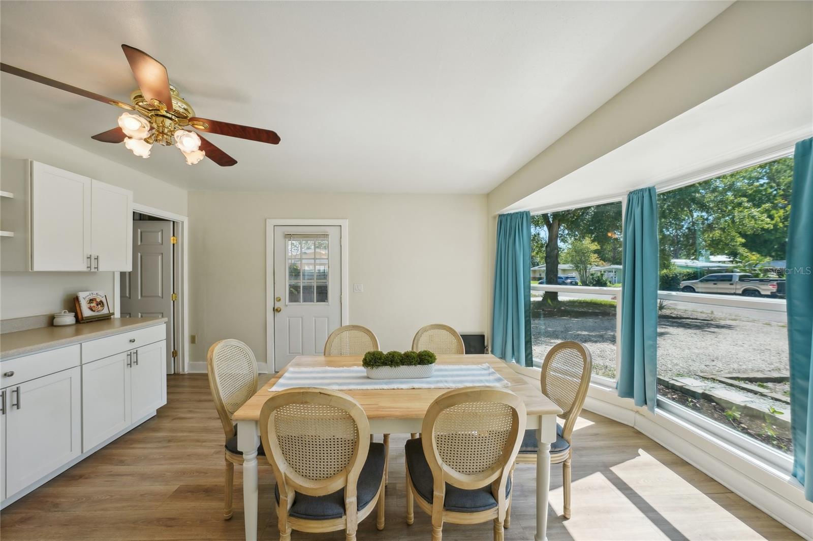 Large dining area with tons of natural light