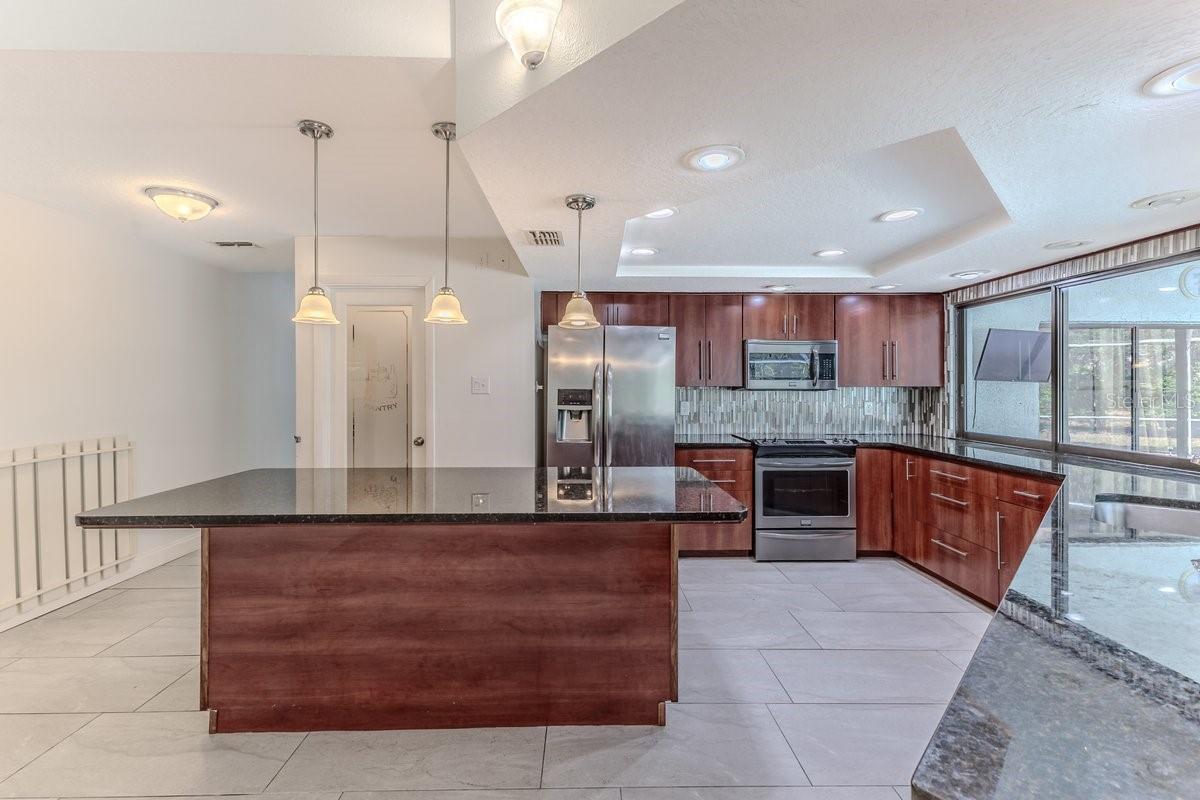 Stainless Steel Appliances + Newer Tile Floors