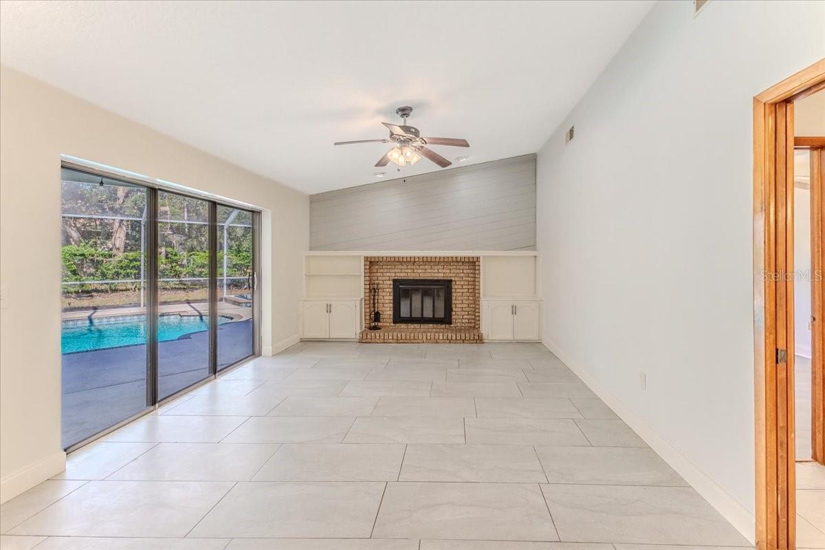 Family Room with Brick Fireplace