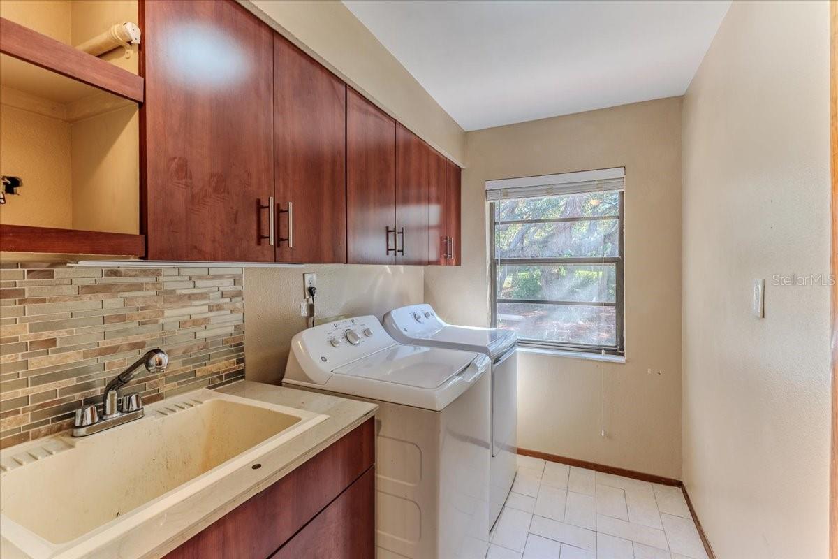 Laundry Room with Cabinets, Utility Sink + Washer & Dryer