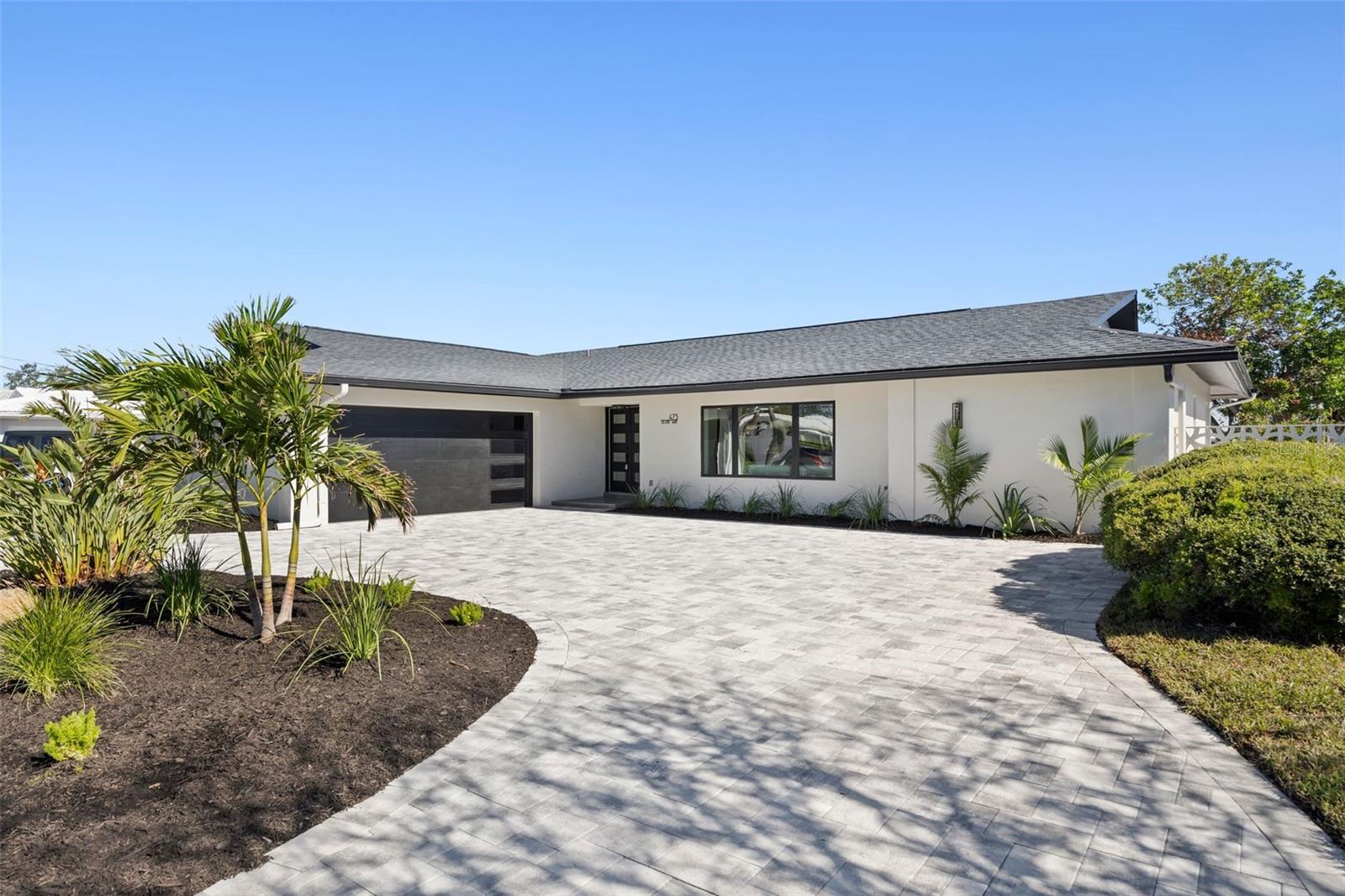 Block home with circular drive , 2 car garage