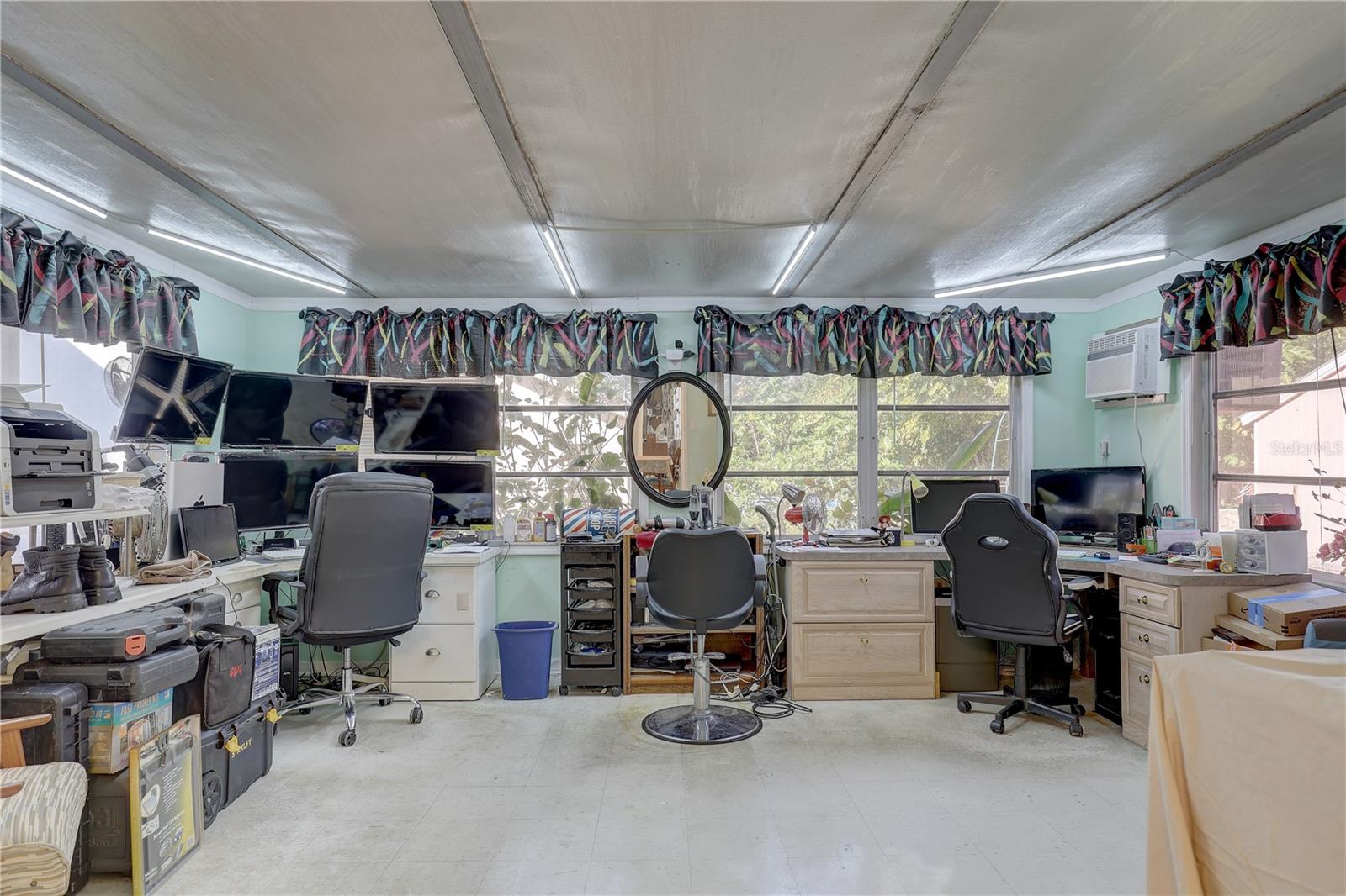 View of bonus room with Air conditioning from dining room