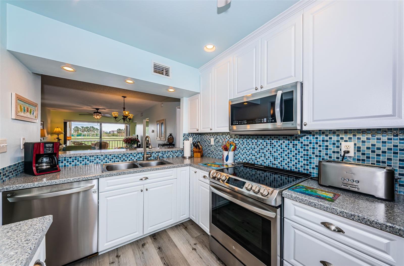 Kitchen has LG Stainless Steel appliances