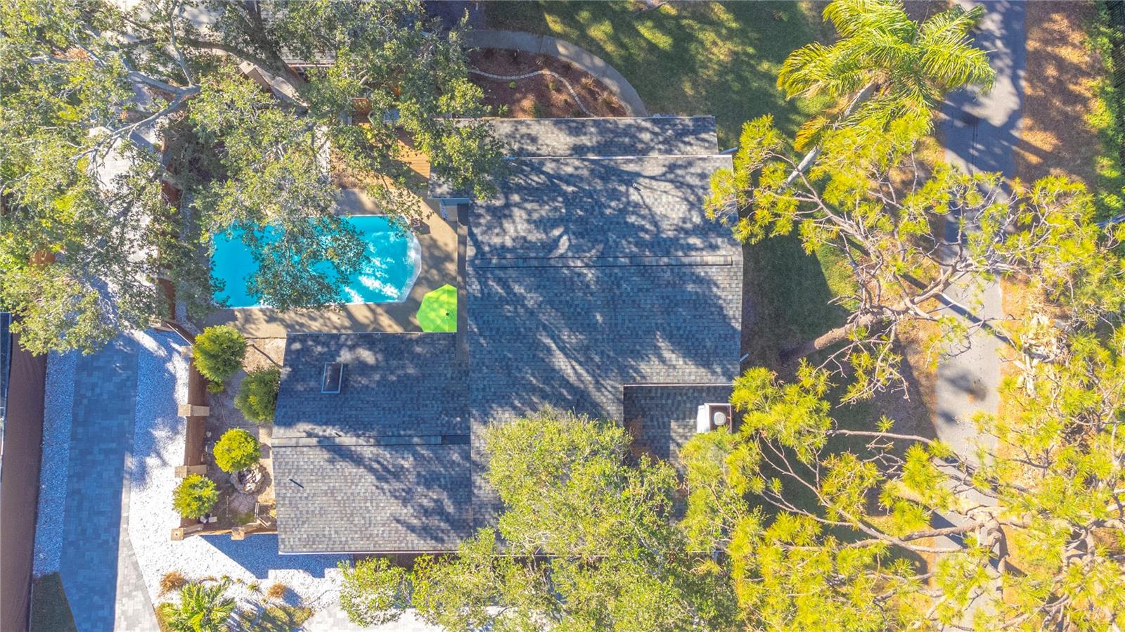 Aerial view with neighboring pond.