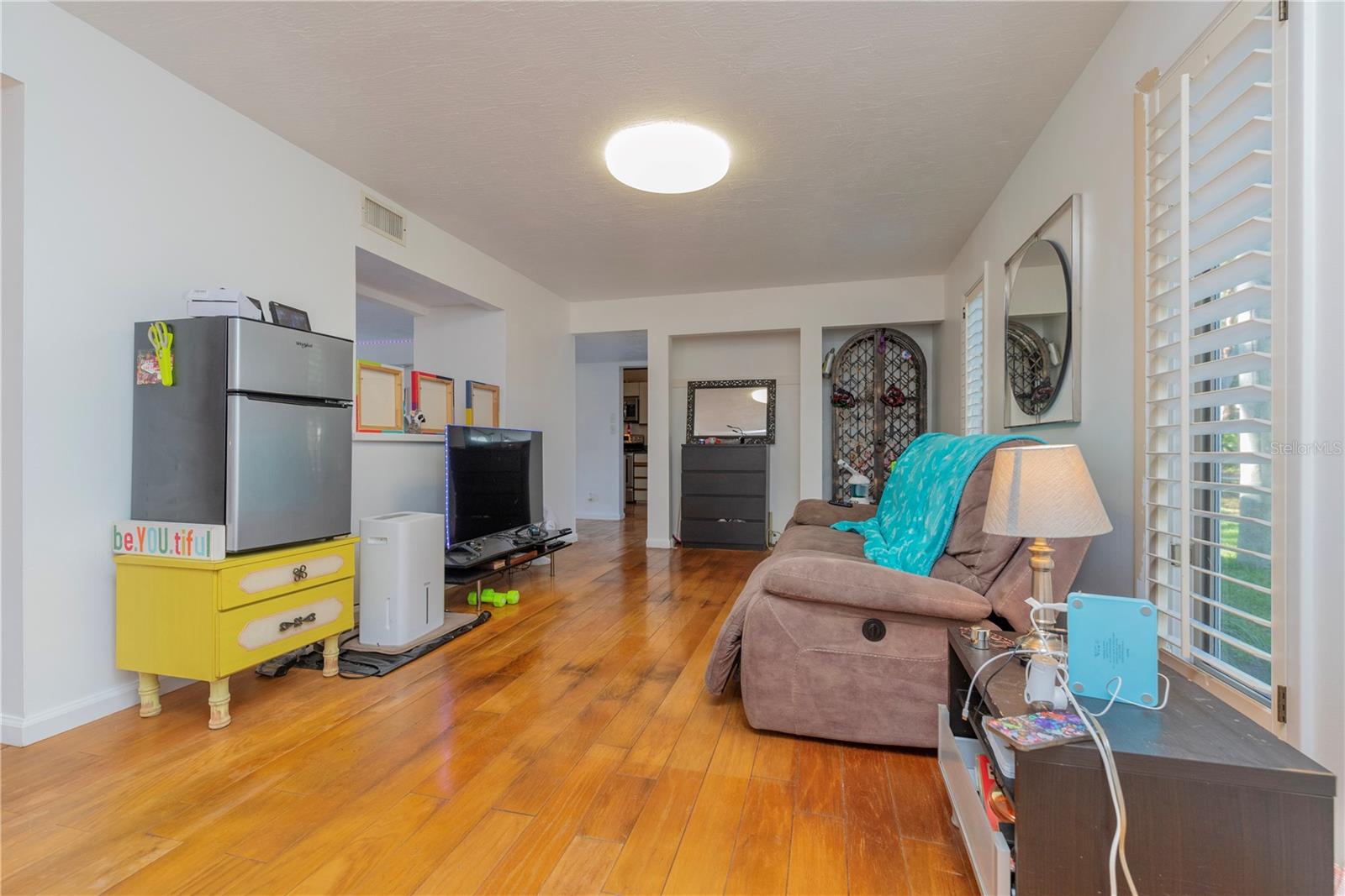 Dining room being used as a den.