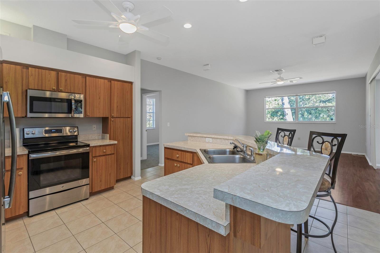 Kitchen with bar-height counter.