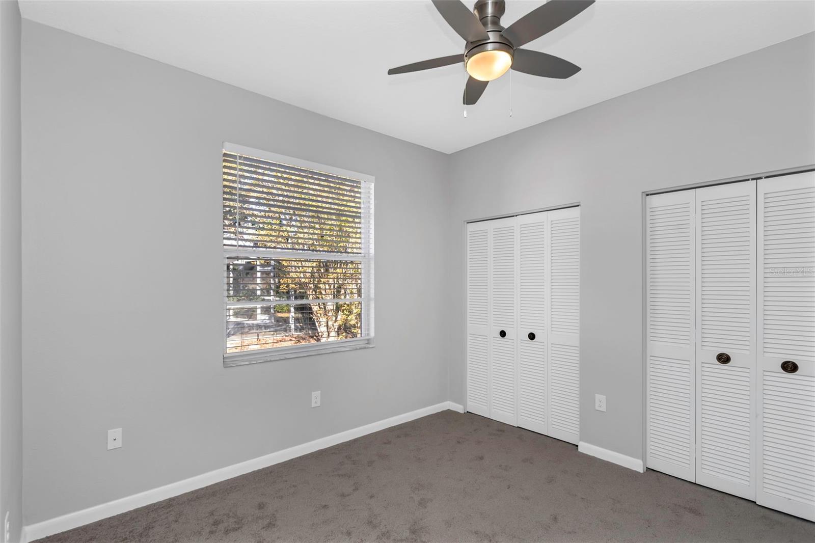 Bedroom 2 with brand new carpeting.