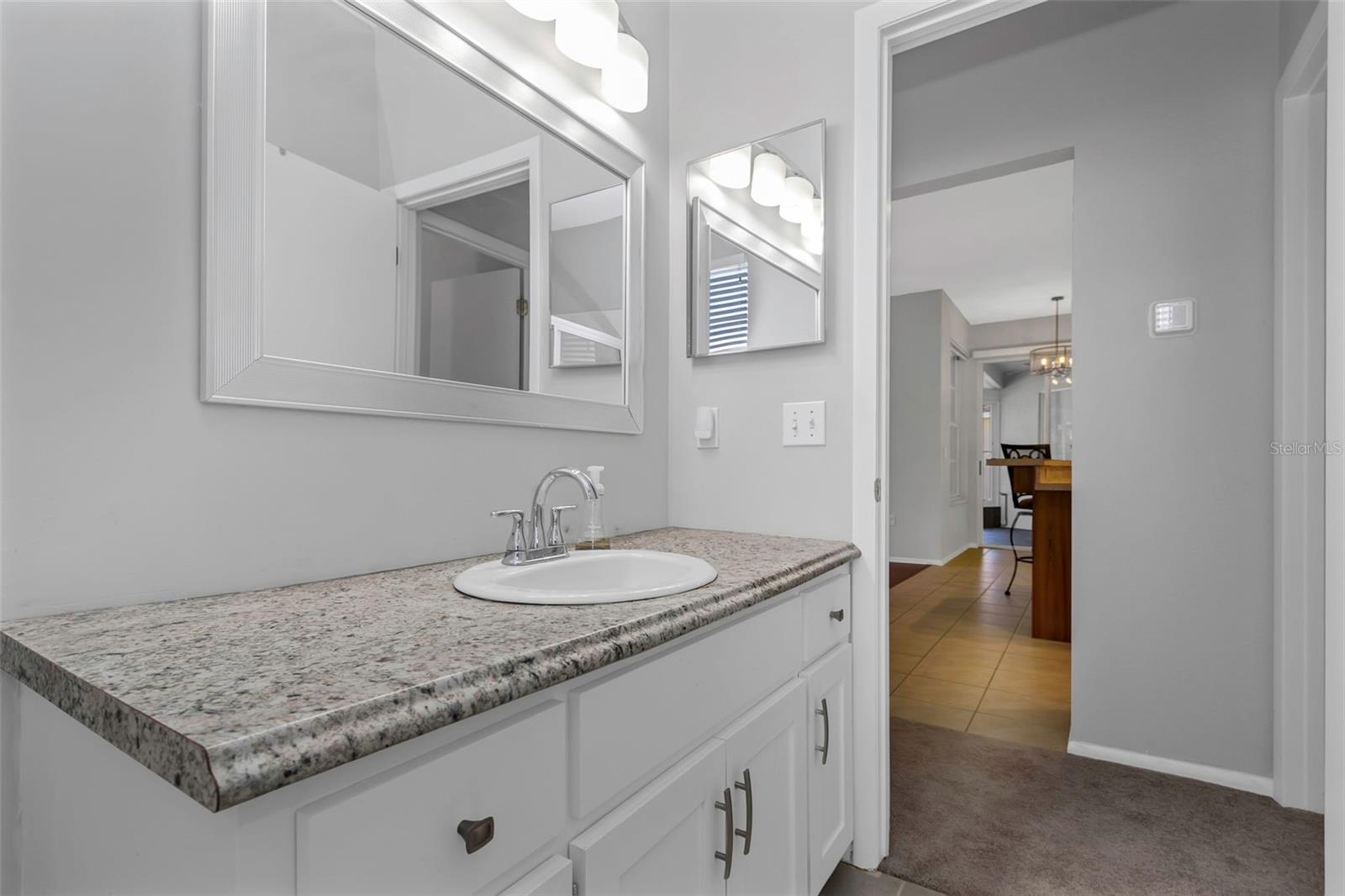 Guest bathroom with shower/tub combination.