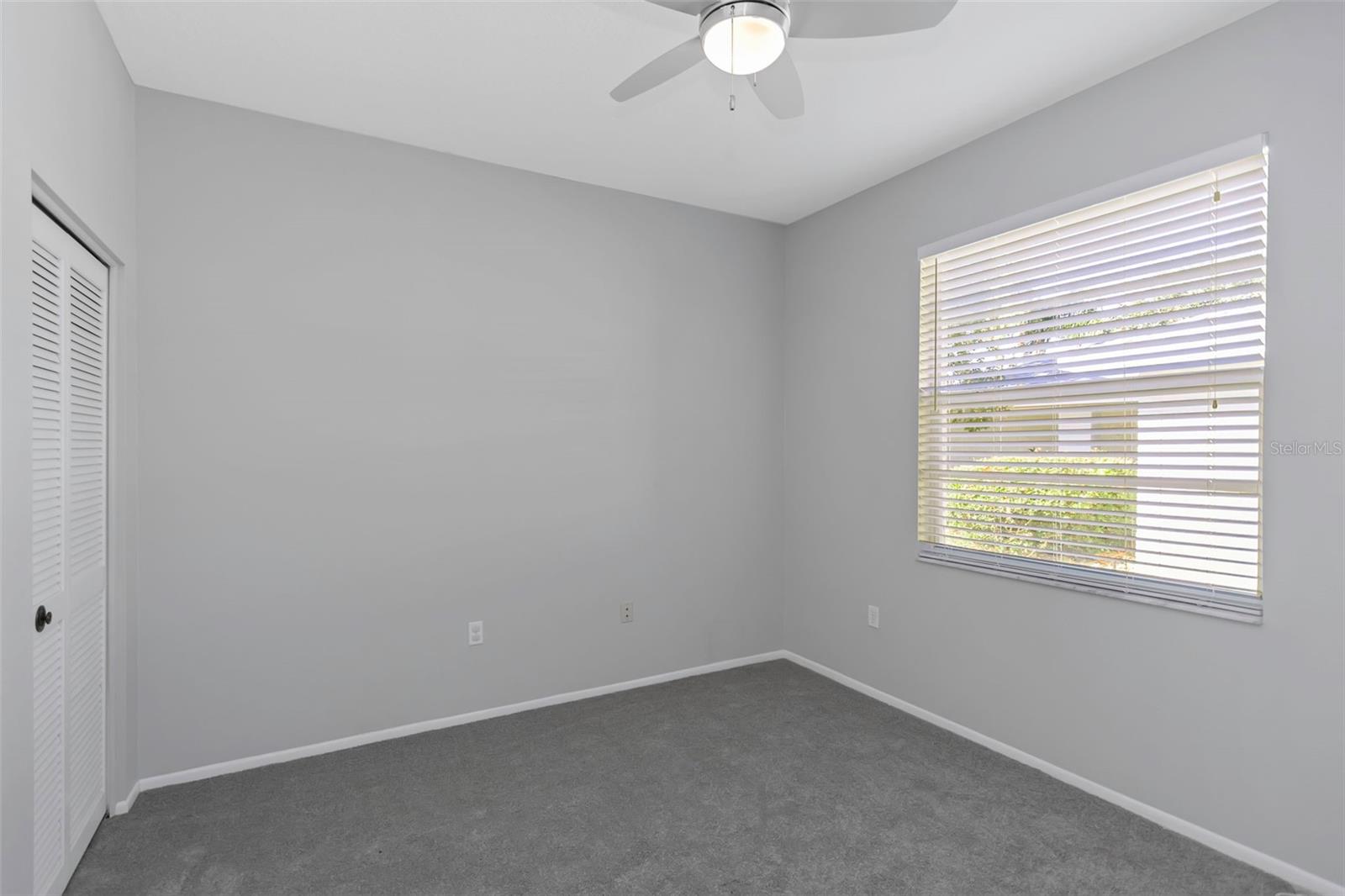 Bedroom 3 with brand new carpeting.