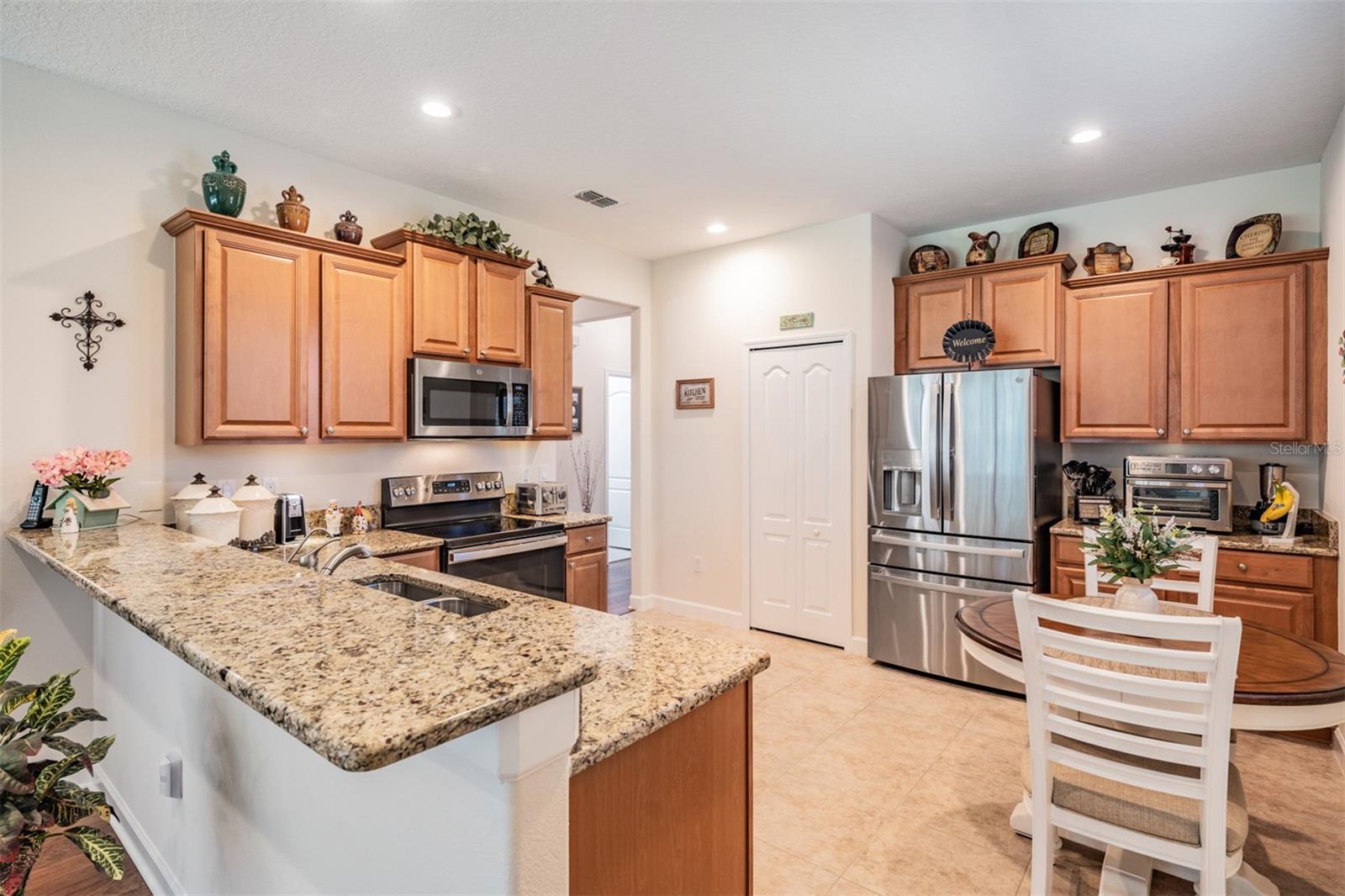 Eat in dinette area with a window overlooking pond