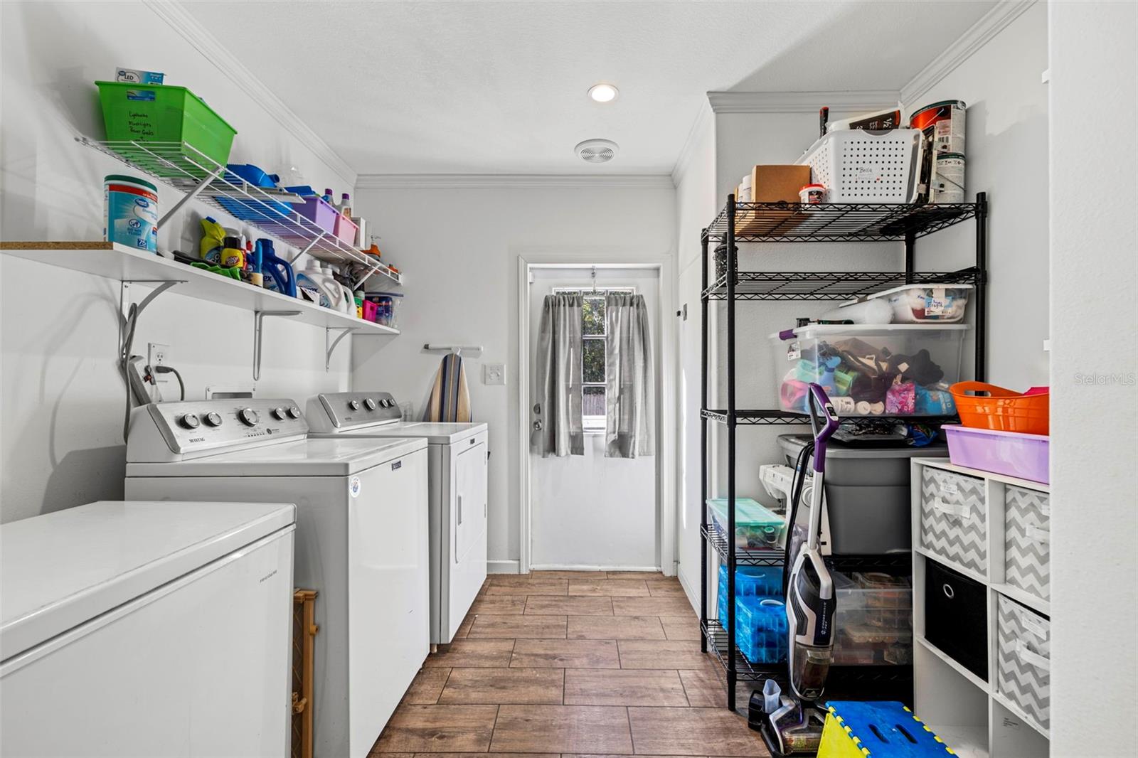 Laundry Room and door to backyard.