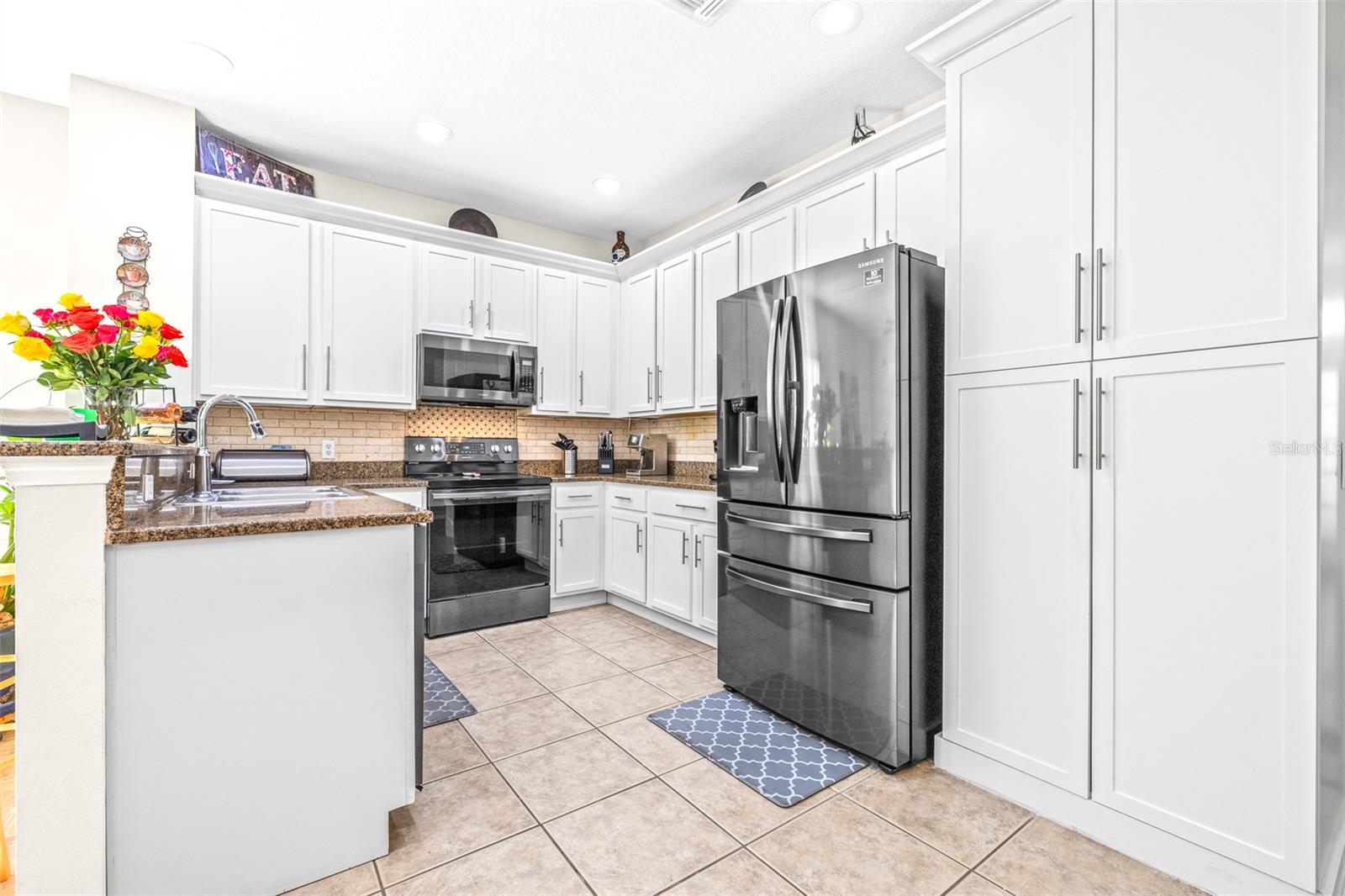 Kitchen with upgraded pantry