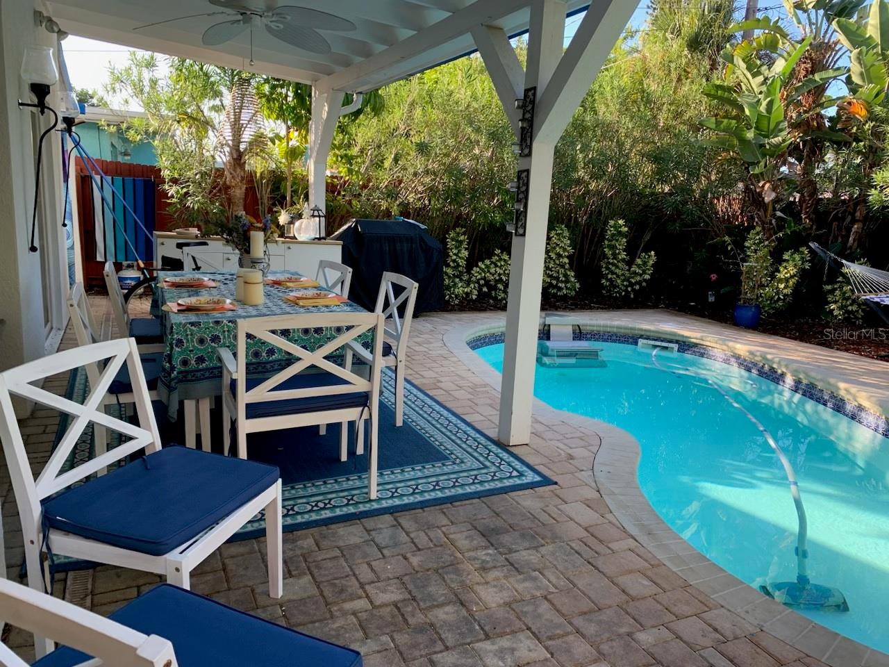 Back yard with pool after storms