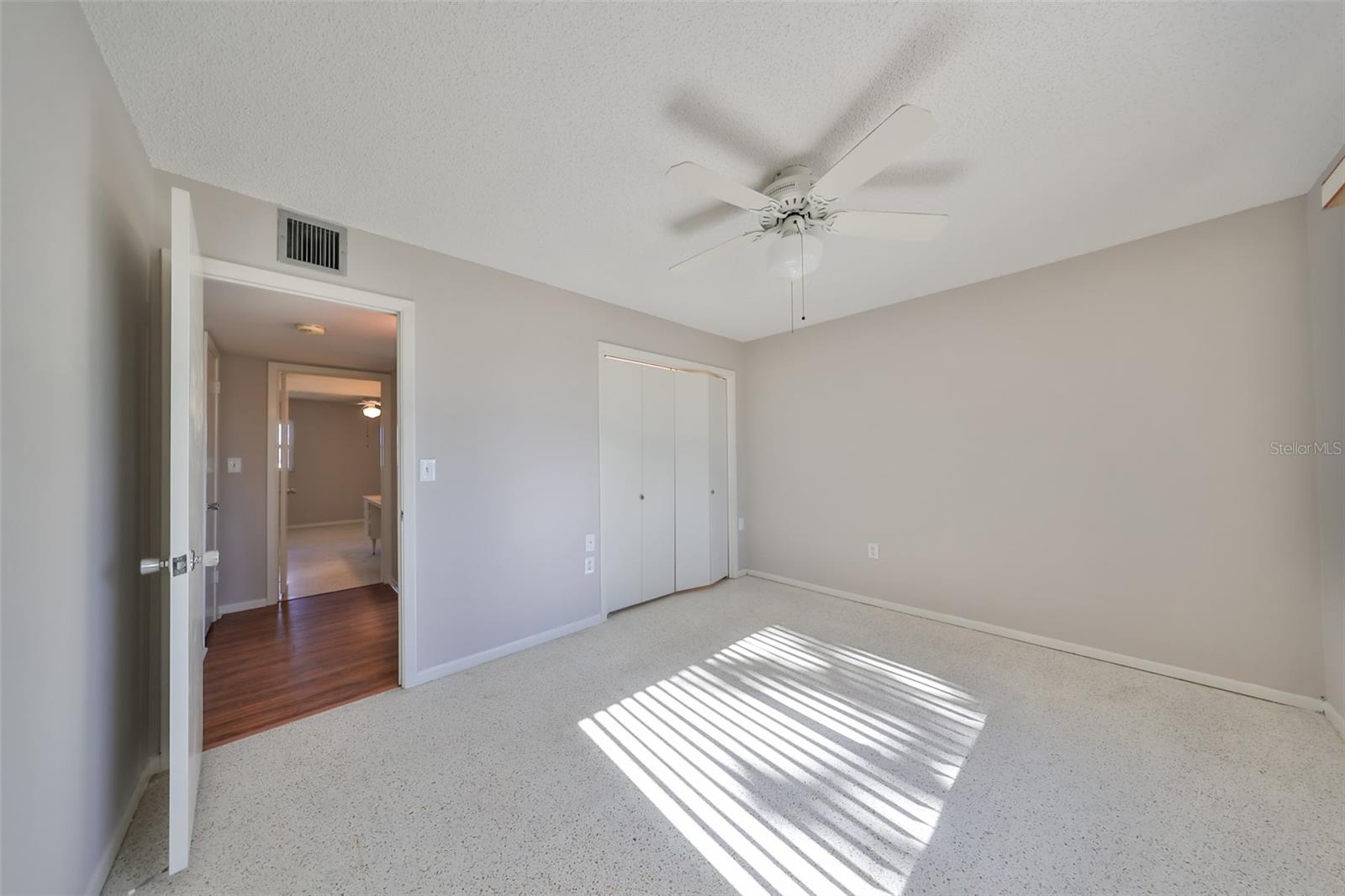 Bedroom 2, exit to hall and foyer