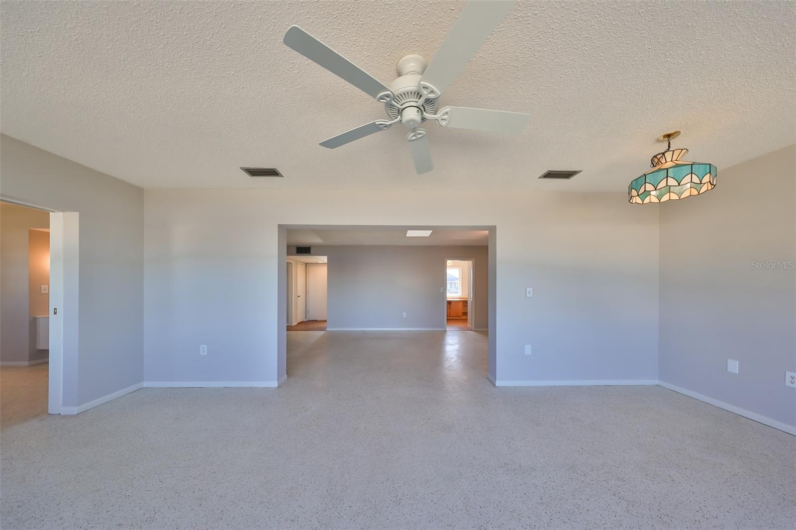 Florida Room, primary bedroom pocket door on left, Great Room center