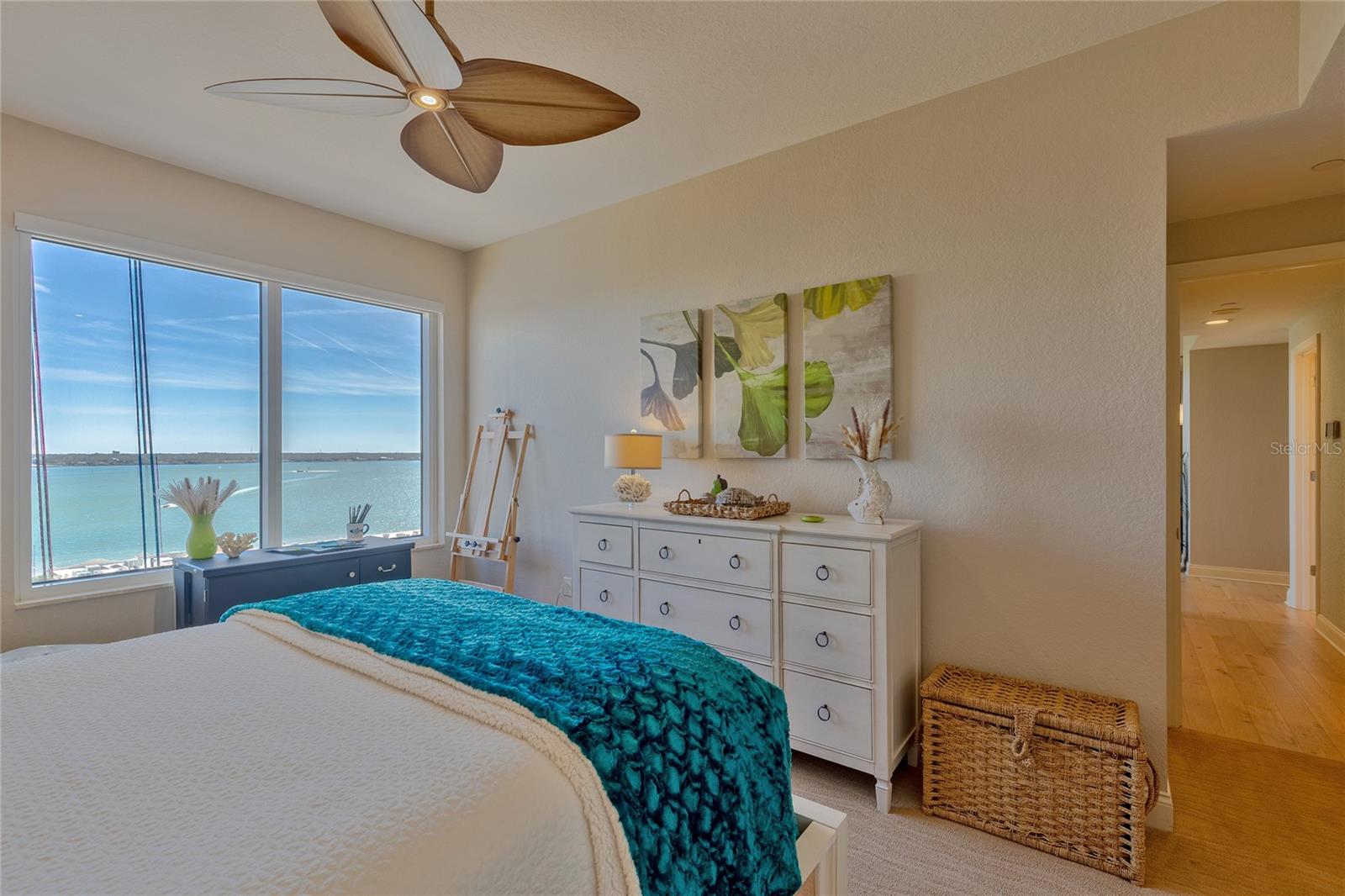 Guest bedroom with East facing water views.