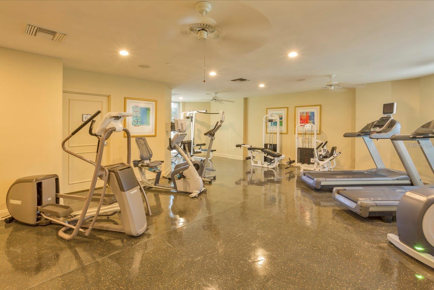 Excercise room with his and her locker rooms with showers, saunas and steam rooms.