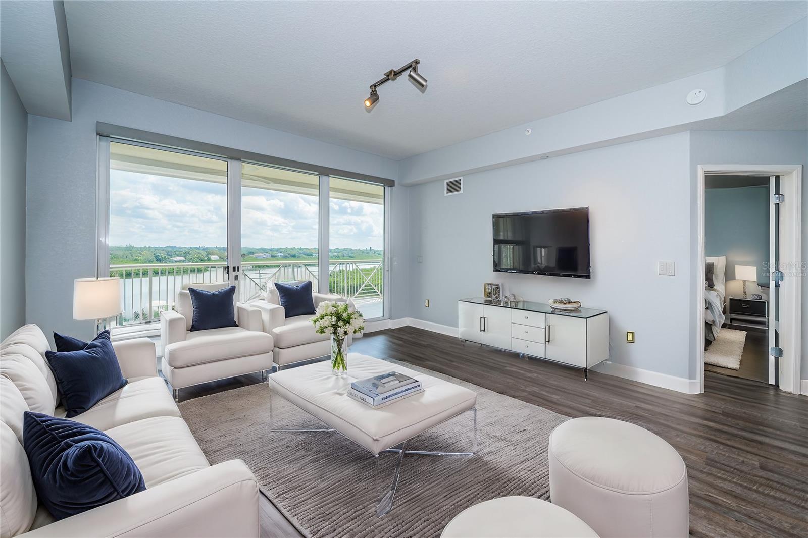 Virtually Staged Living Room with Sliders to the Balcony