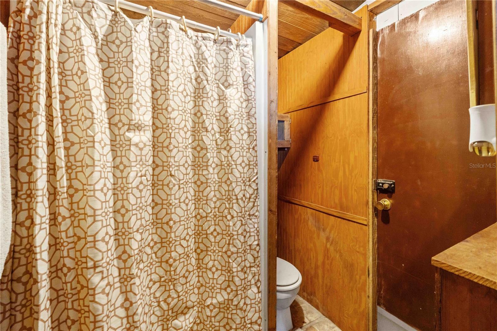 Second full bathroom located in the garage