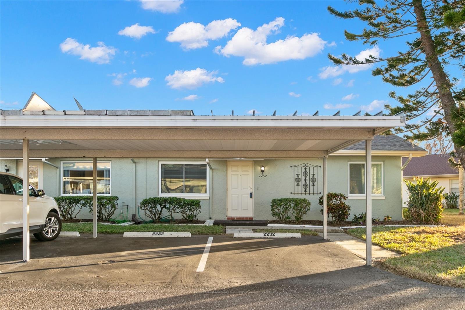 Front Exterior - Two Covered Parking Spots