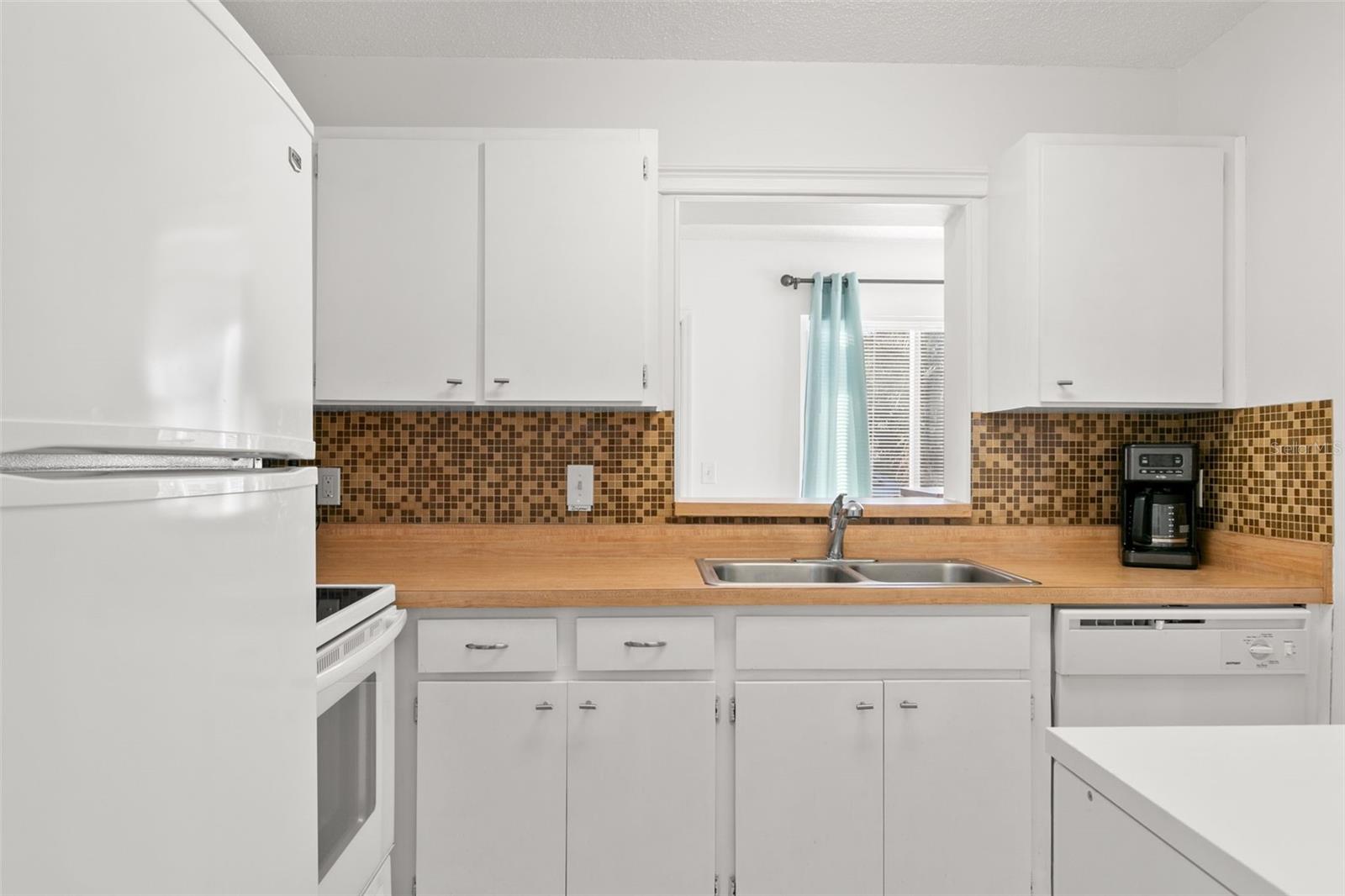 Kitchen with Pass Through into Florida Room