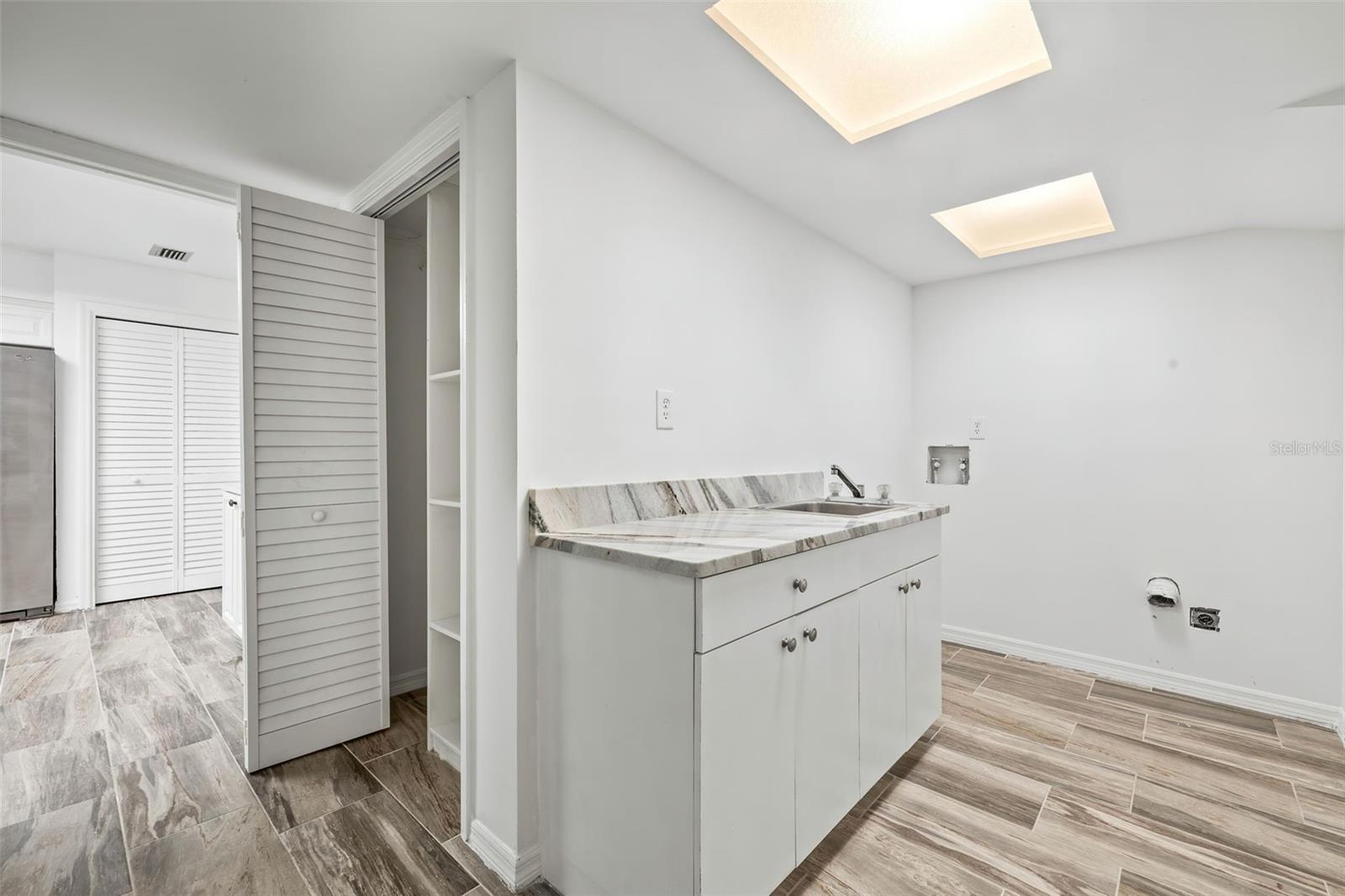 Laundry Room located Downstairs