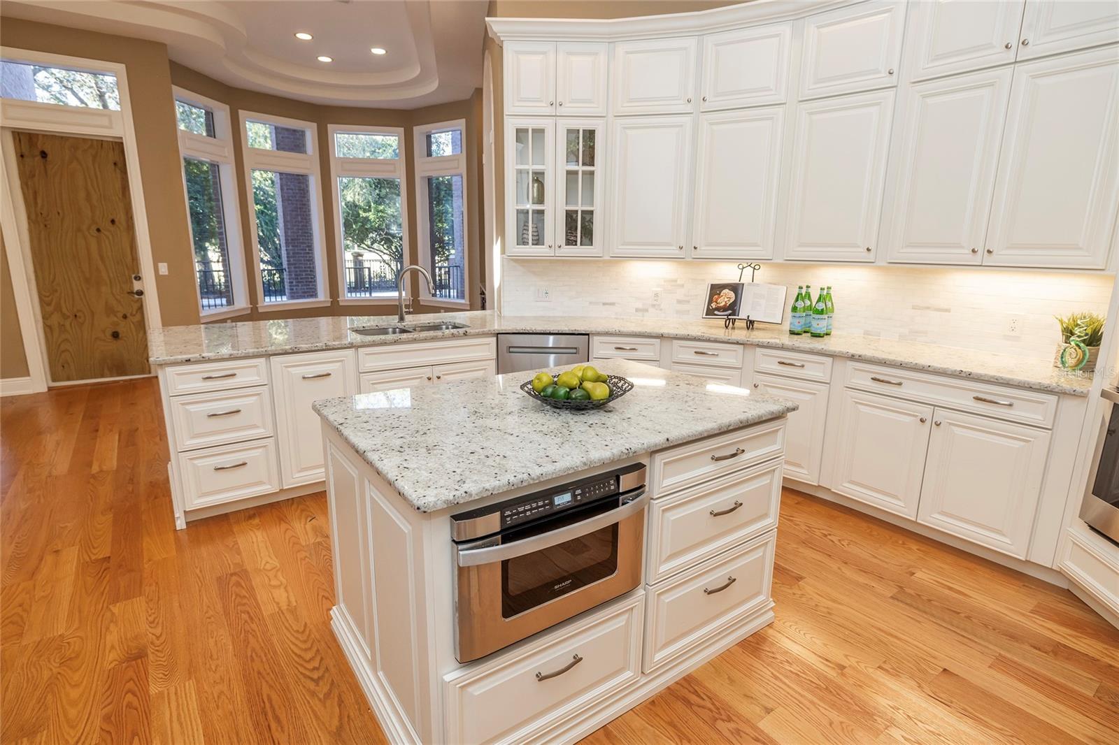 Kitchen opens to breakfast room and to family room