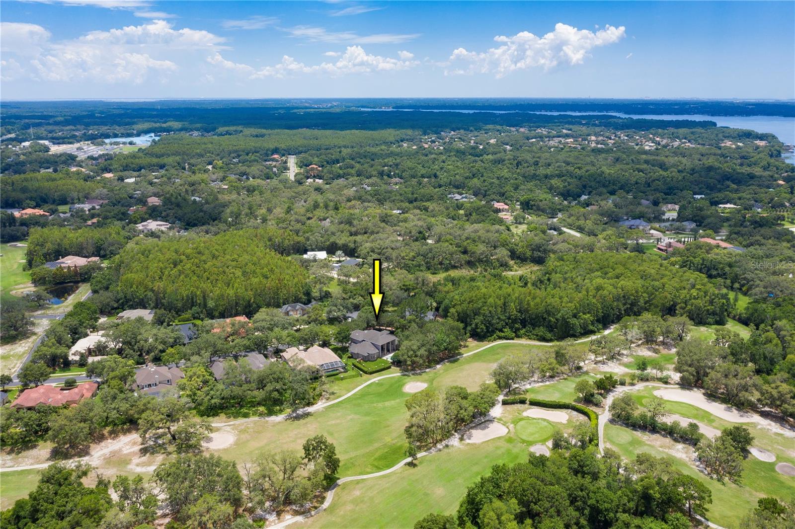 Golf course location and you can see Lake Tarpon in the distance.  Access to the lake via John Chestnut Park which is just a few minutes away.