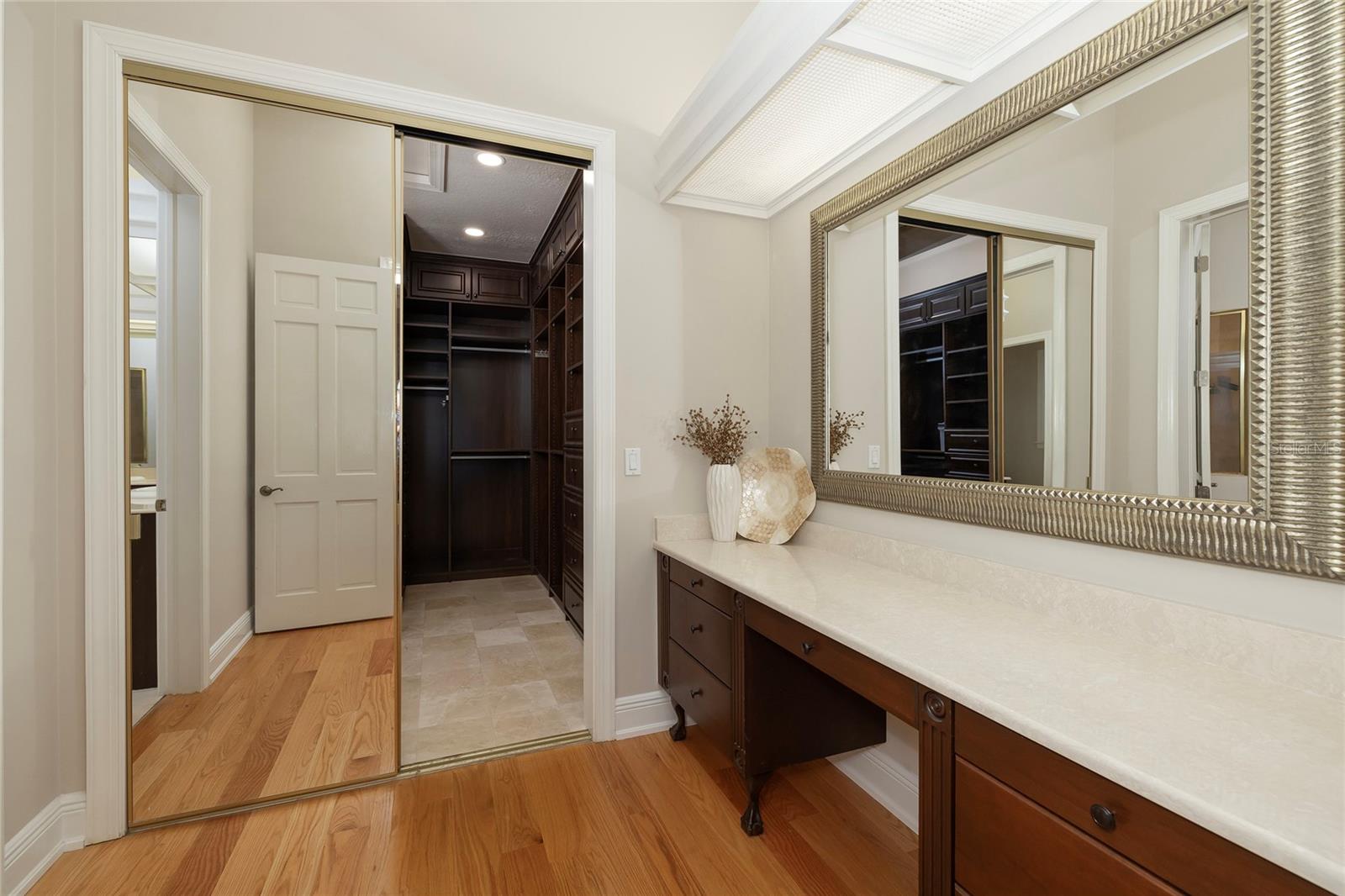 Primary suite opens to fabulous walk in closet.