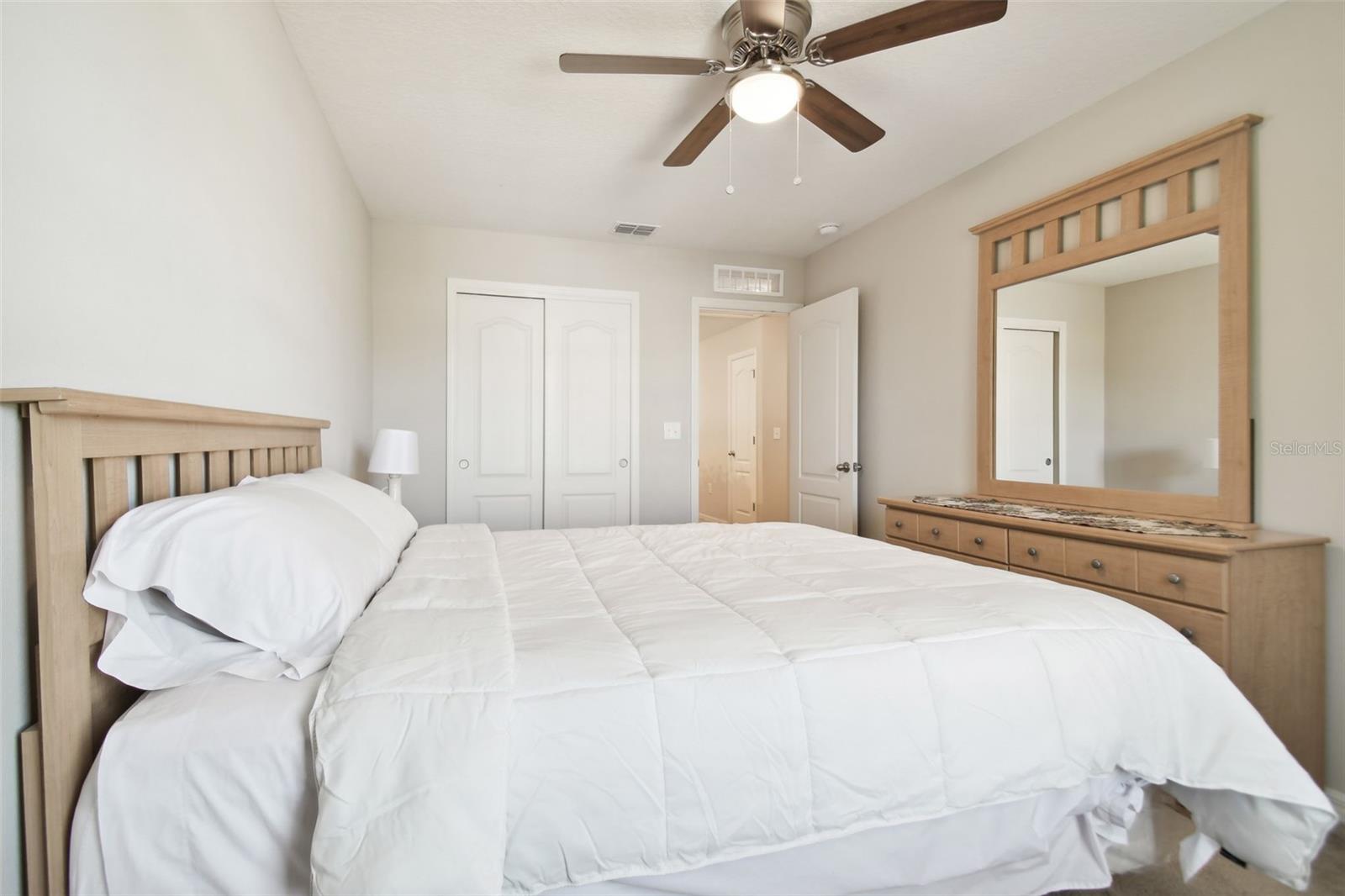 Bedroom 3 with ceiling fan