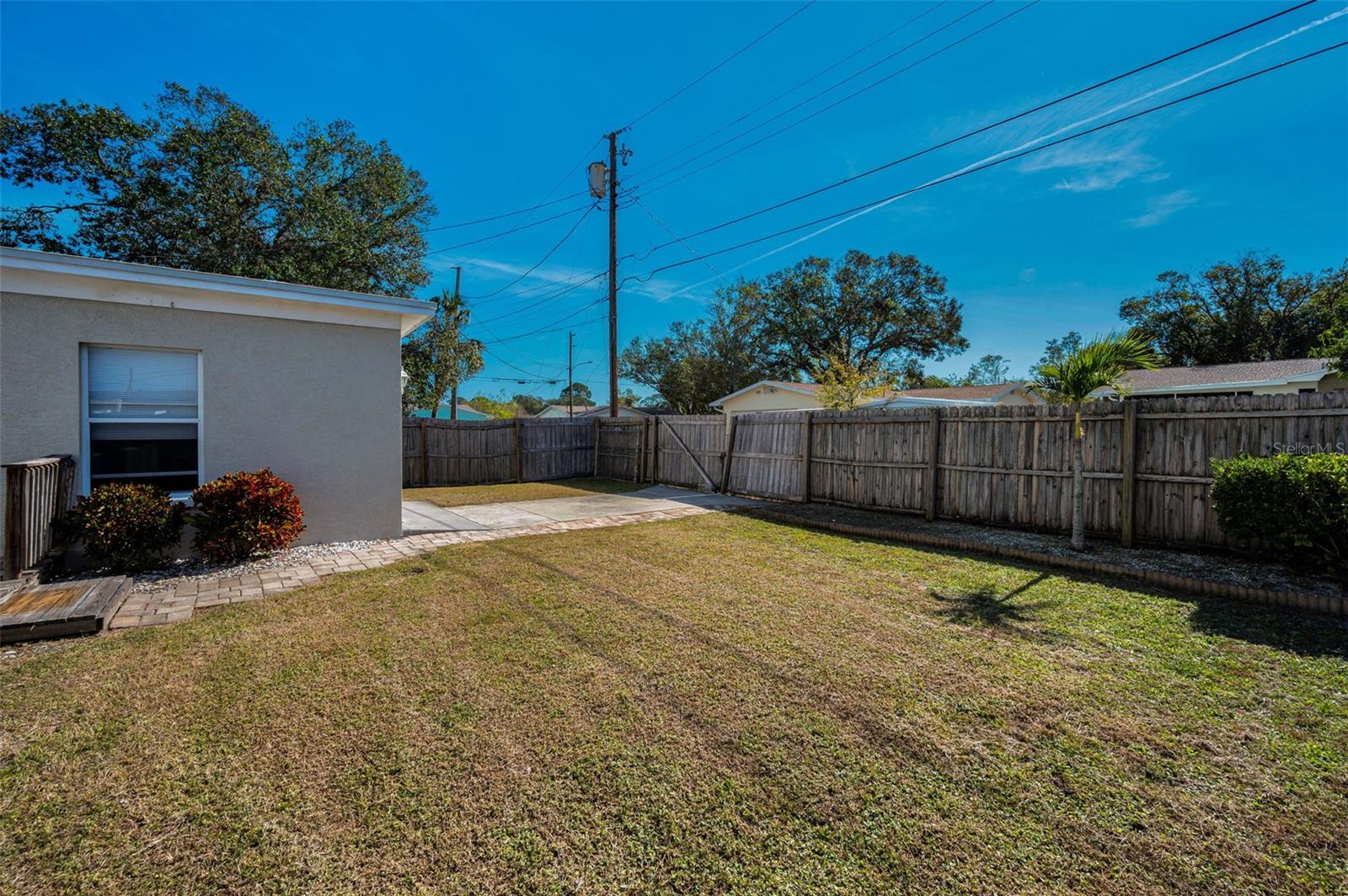 Alley access to rear over sized one car garage.