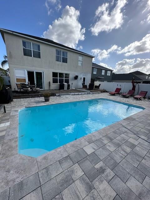 Tropical Oasis of a backyard with saltwater pool!