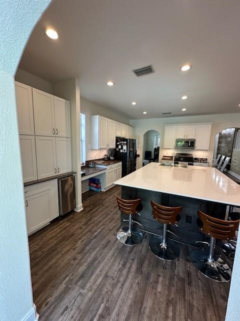 Huge kitchen Island with custom sink and breakfast bar / seating for all!