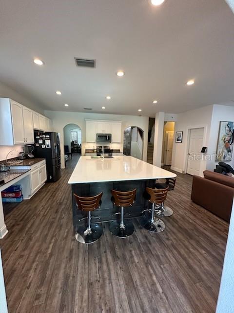 Huge kitchen Island with custom sink and breakfast bar / seating for all!