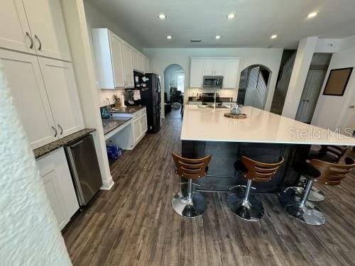 Huge kitchen Island with custom sink and breakfast bar / seating for all!