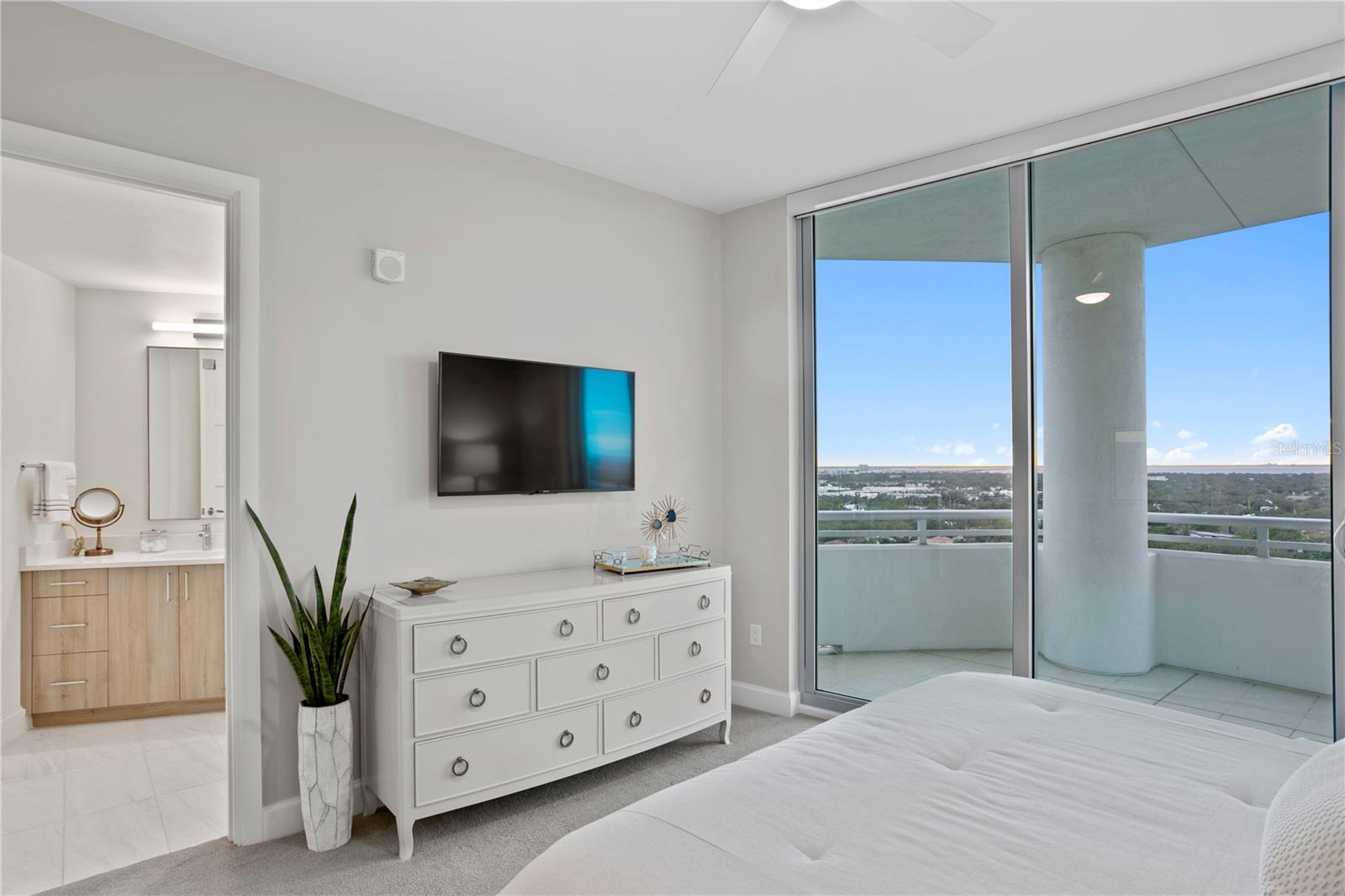 Guests won't want to leave with the comfort of the 2nd bedroom guest suite with access to balcony and gorgeous views extending to Old Tampa Bay!