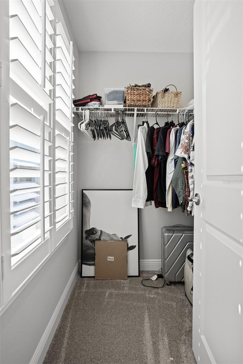 Guest bedroom 1 walk -in closet