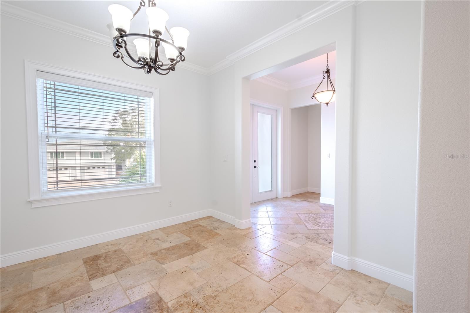 The Dining Room with a view of the foyer.