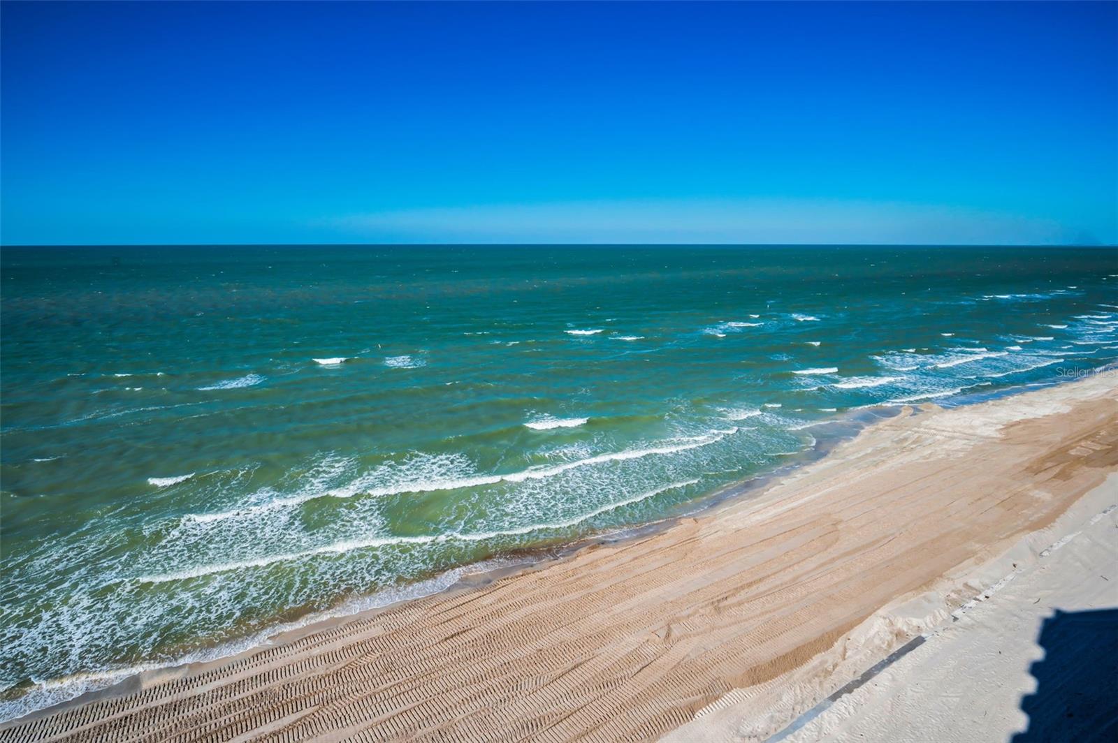 The View of the Gulf from your Wraparound Balcony off the Living Room, Sunroom and Primary Bedroom!